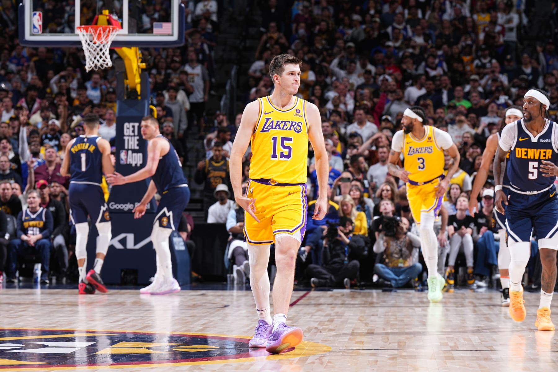DENVER, CO - APRIL 29: Austin Reaves #15 of the Los Angeles Lakers celebrates during the game against the Denver Nuggets during Round 1 Game 5 of the 2024 NBA Playoffs on April 29, 2024 at the Ball Arena in Denver, Colorado. NOTE TO USER: User expressly acknowledges and agrees that, by downloading and/or using this Photograph, user is consenting to the terms and conditions of the Getty Images License Agreement. Mandatory Copyright Notice: Copyright 2024 NBAE (Photo by Garrett Ellwood/NBAE via Getty Images)