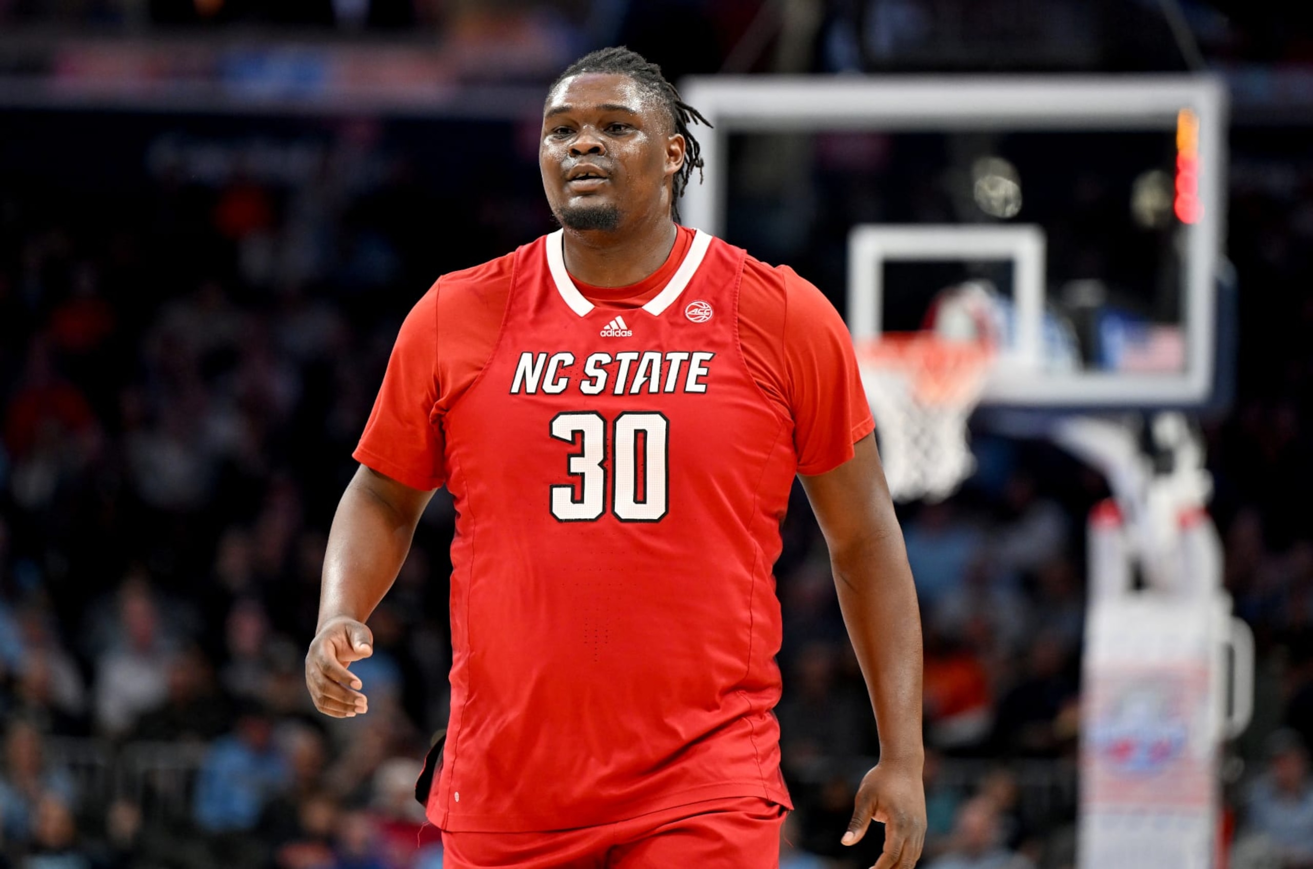 WASHINGTON, DC - MARCH 15: DJ Burns Jr. #30 of the North Carolina State Wolfpack walks down the court during the game against the Virginia Cavaliers in the Semifinals of the ACC Men's Basketball Tournament at Capital One Arena on March 15, 2024 in Washington, DC. (Photo by Greg Fiume/Getty Images) WASHINGTON, DC - MARCH 15: DJ Burns Jr. #30 of the North Carolina State Wolfpack walks down the court during the game against the Virginia Cavaliers in the Semifinals of the ACC Men's Basketball Tournament at Capital One Arena on March 15, 2024 in Washington, DC. (Photo by Greg Fiume/Getty Images)