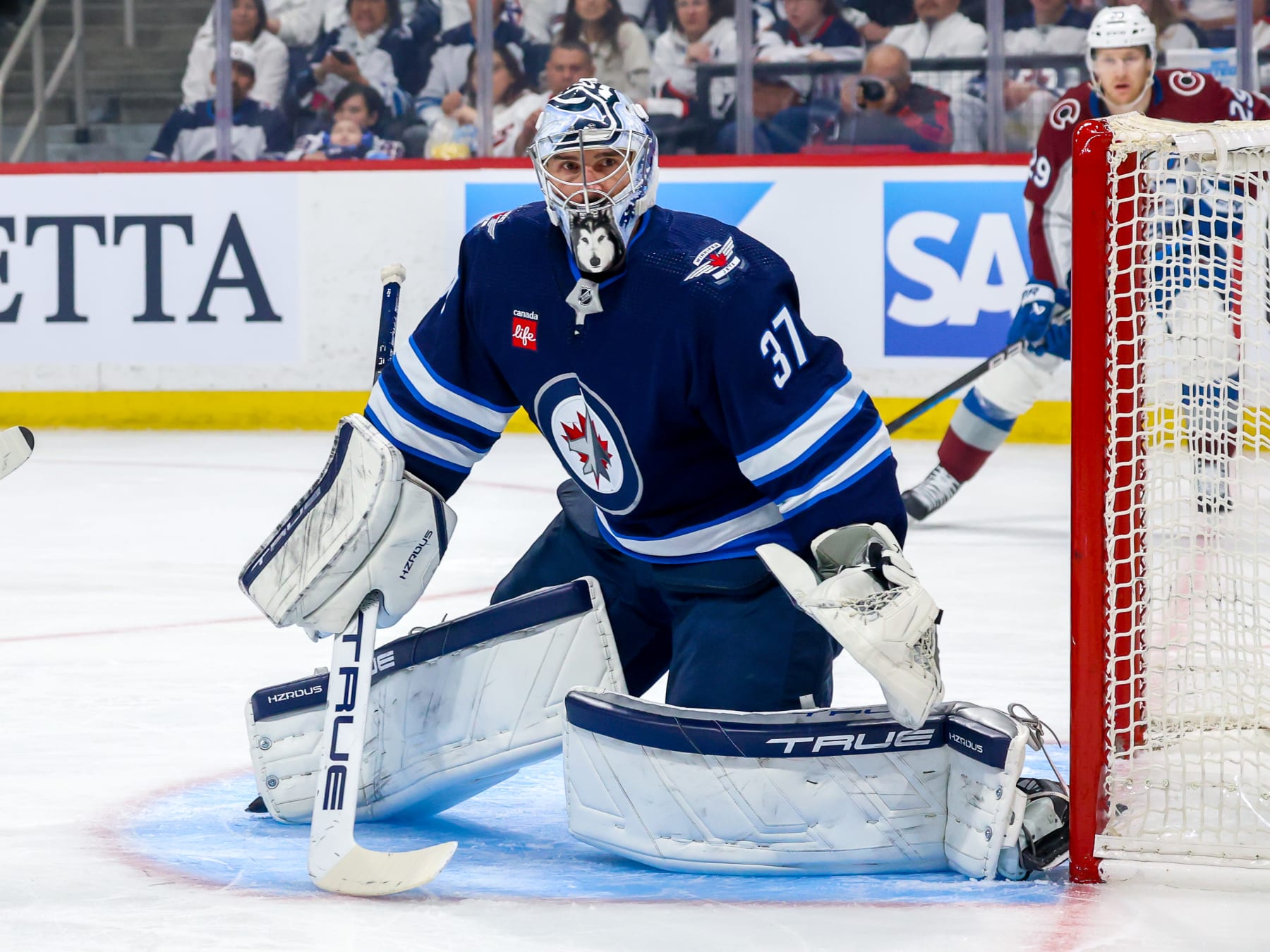 WINNIPEG, CANADA - APRIL 30: Goaltender Connor Hellebuyck #37 of the Winnipeg Jets guards the net during first period action against the Colorado Avalanche in Game Five of the First Round of the 2024 Stanley Cup Playoffs at Canada Life Centre on April 30, 2024 in Winnipeg, Manitoba, Canada. (Photo by Jonathan Kozub/NHLI via Getty Images)