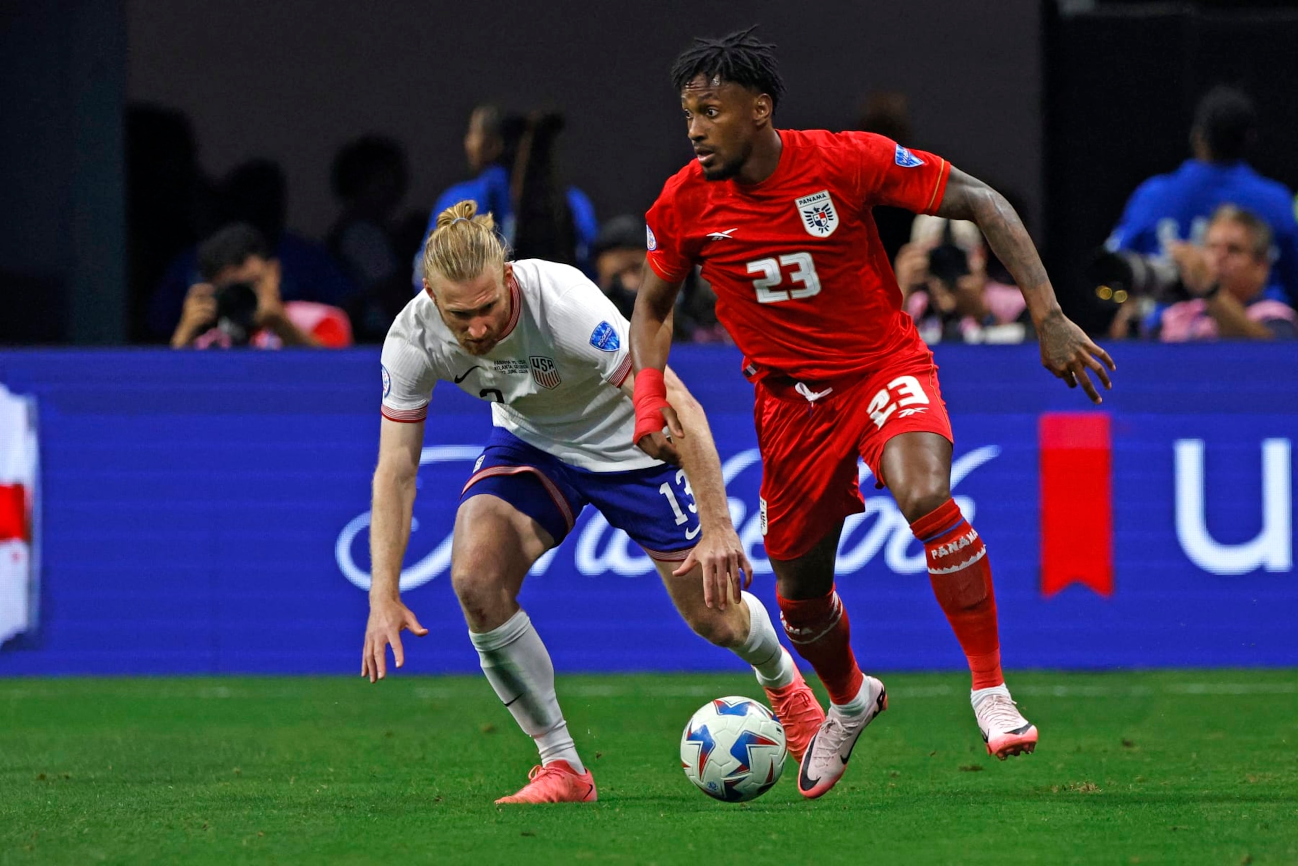 USA's defender #13 Tim Ream fights for the ball with Panama's defender #23 Michael Murillo during the Conmebol 2024 Copa America tournament group C football match between Panama and USA at Mercedes Benz Stadium in Atlanta, Georgia, on June 27, 2024. (Photo by EDUARDO MUNOZ / AFP) (Photo by EDUARDO MUNOZ/AFP via Getty Images) USA's defender #13 Tim Ream fights for the ball with Panama's defender #23 Michael Murillo during the Conmebol 2024 Copa America tournament group C football match between Panama and USA at Mercedes Benz Stadium in Atlanta, Georgia, on June 27, 2024. (Photo by EDUARDO MUNOZ / AFP) (Photo by EDUARDO MUNOZ/AFP via Getty Images)