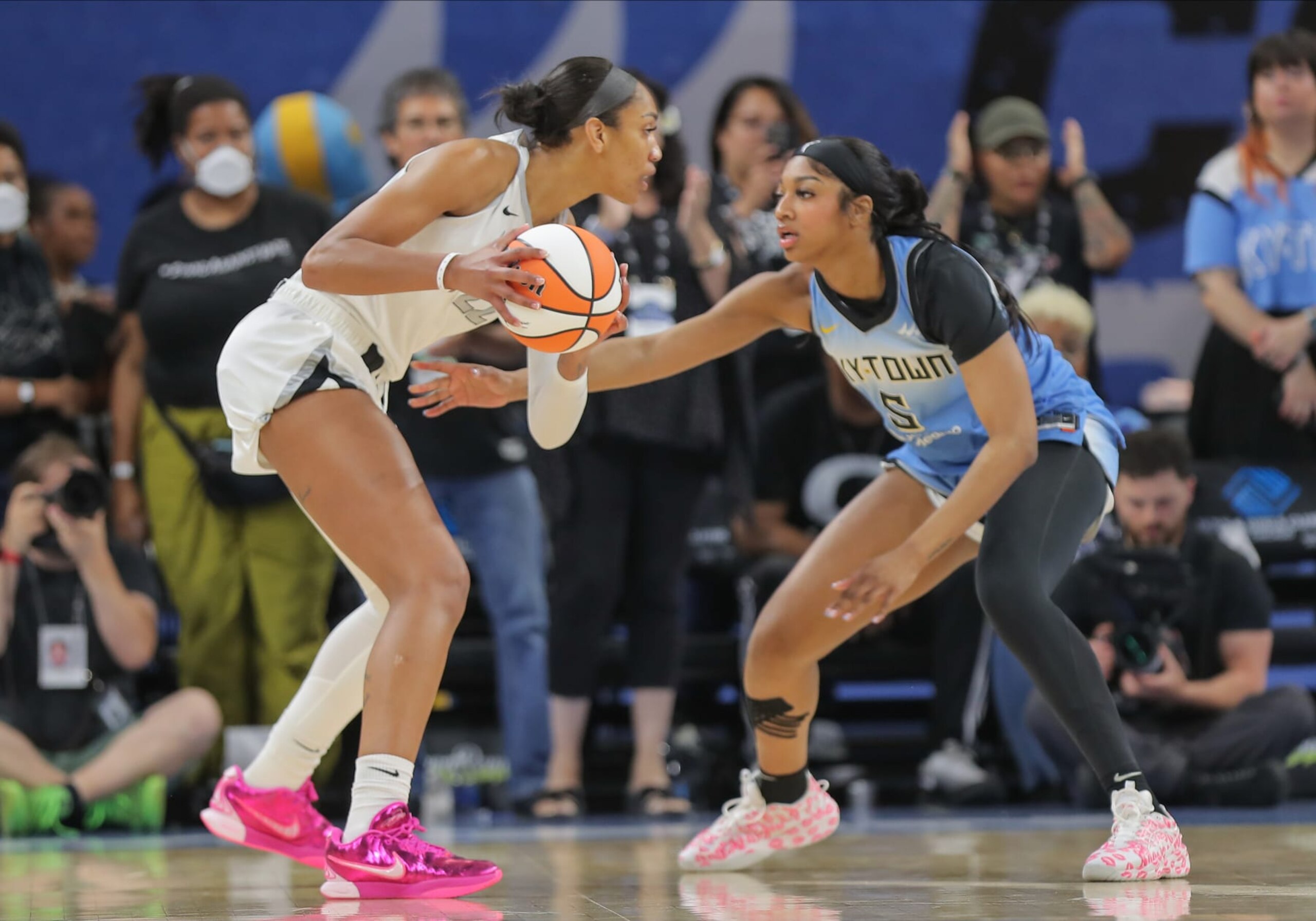 CHICAGO, IL - JUNE 27: forward Angel Reese #5 of the Chicago Sky guards A'ja Wilson #22 of the Las Vegas Aces during the first half on June 27,2024 at Wintrust Arena in Chicago, Illinois. (Photo by Melissa Tamez/Icon Sportswire via Getty Images) CHICAGO, IL - JUNE 27: forward Angel Reese #5 of the Chicago Sky guards A'ja Wilson #22 of the Las Vegas Aces during the first half on June 27,2024 at Wintrust Arena in Chicago, Illinois. (Photo by Melissa Tamez/Icon Sportswire via Getty Images)