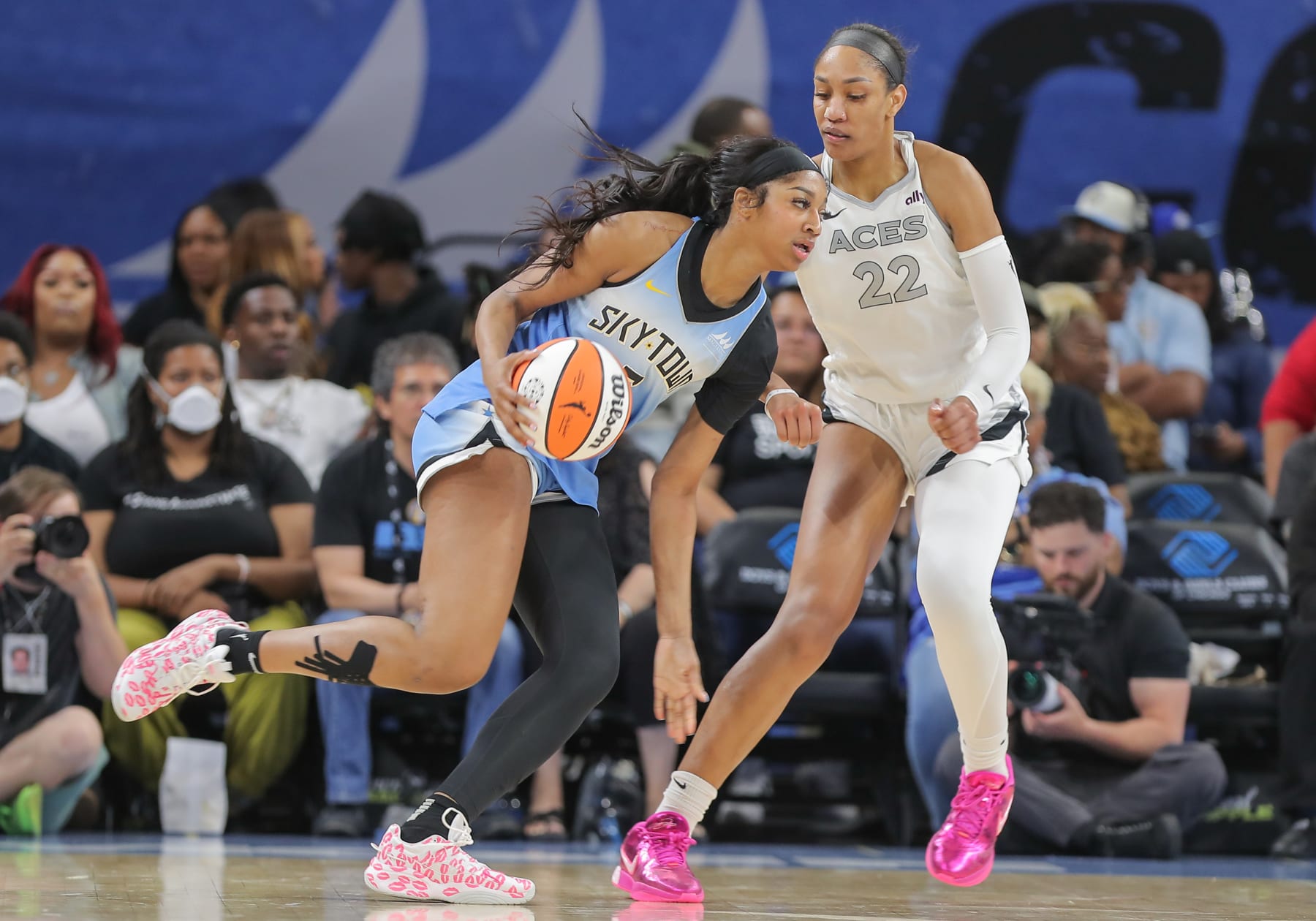 CHICAGO, IL - JUNE 27: A'ja Wilson #22 of the Las Vegas Aces guards  Angel Reese #5 of the Chicago Sky during the second half on June 27,2024 at Wintrust Arena in Chicago, Illinois. (Photo by Melissa Tamez/Icon Sportswire via Getty Images)