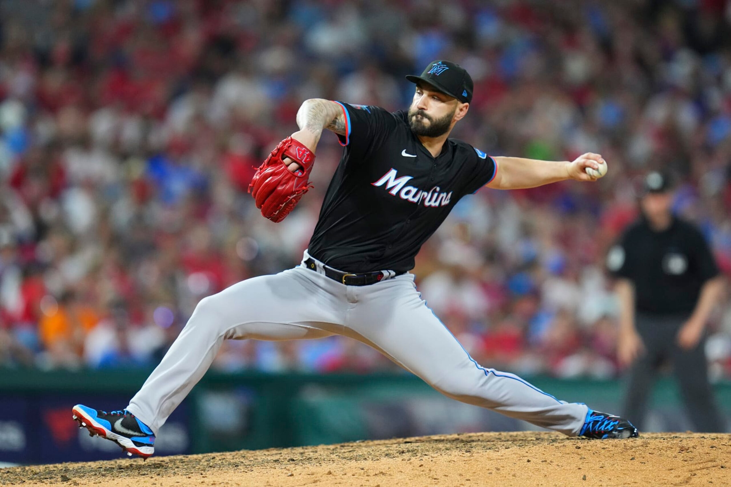PHILADELPHIA, PENNSYLVANIA - JUNE 27: Tanner Scott #66 of the Miami Marlins throws a pitch in the bottom of the ninth inning against the Philadelphia Phillies at Citizens Bank Park on June 27, 2024 in Philadelphia, Pennsylvania. The Marlins defeated the Phillies 7-4. (Photo by Mitchell Leff/Getty Images) PHILADELPHIA, PENNSYLVANIA - JUNE 27: Tanner Scott #66 of the Miami Marlins throws a pitch in the bottom of the ninth inning against the Philadelphia Phillies at Citizens Bank Park on June 27, 2024 in Philadelphia, Pennsylvania. The Marlins defeated the Phillies 7-4. (Photo by Mitchell Leff/Getty Images)