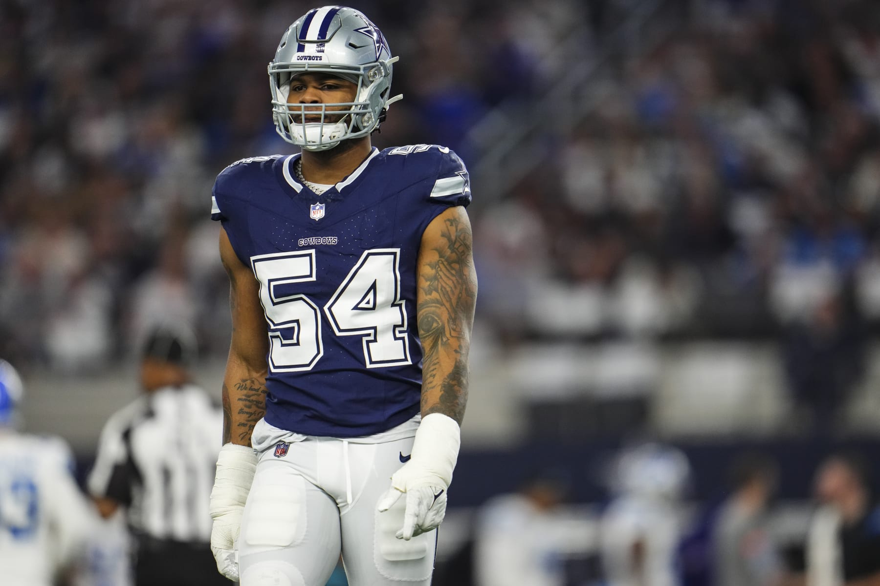 ARLINGTON, TX - DECEMBER 30: Sam Williams #54 of the Dallas Cowboys looks on from the field during an NFL football game against the Detroit Lions at AT&T Stadium on December 30, 2023 in Arlington, Texas. (Photo by Cooper Neill/Getty Images)