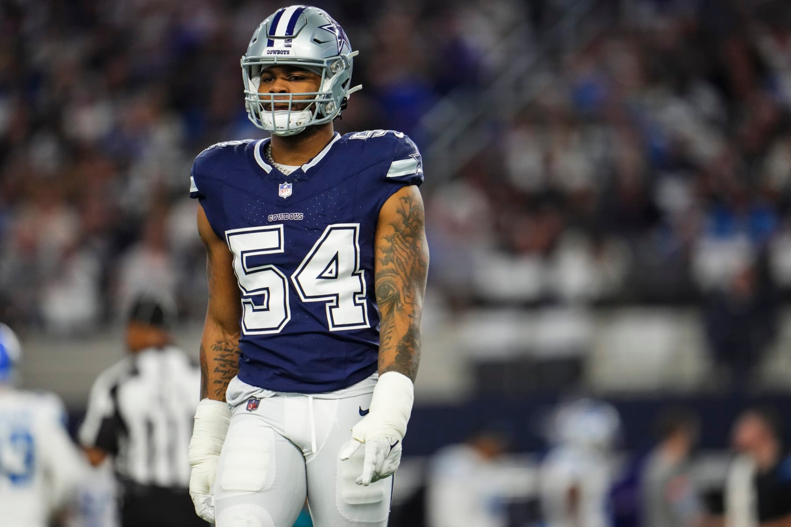 ARLINGTON, TX - DECEMBER 30: Sam Williams #54 of the Dallas Cowboys looks on from the field during an NFL football game against the Detroit Lions at AT&T Stadium on December 30, 2023 in Arlington, Texas. (Photo by Cooper Neill/Getty Images)