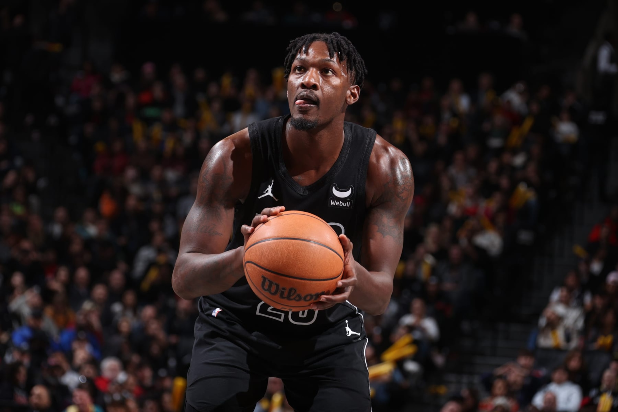 BROOKLYN, NY - MARCH 29: Dorian Finney-Smith #28 of the Brooklyn Nets shoots a free throw during the game against the Chicago Bulls on March 29, 2024 at Barclays Center in Brooklyn, New York. NOTE TO USER: User expressly acknowledges and agrees that, by downloading and or using this Photograph, user is consenting to the terms and conditions of the Getty Images License Agreement. Mandatory Copyright Notice: Copyright 2024 NBAE (Photo by Nathaniel S. Butler/NBAE via Getty Images)