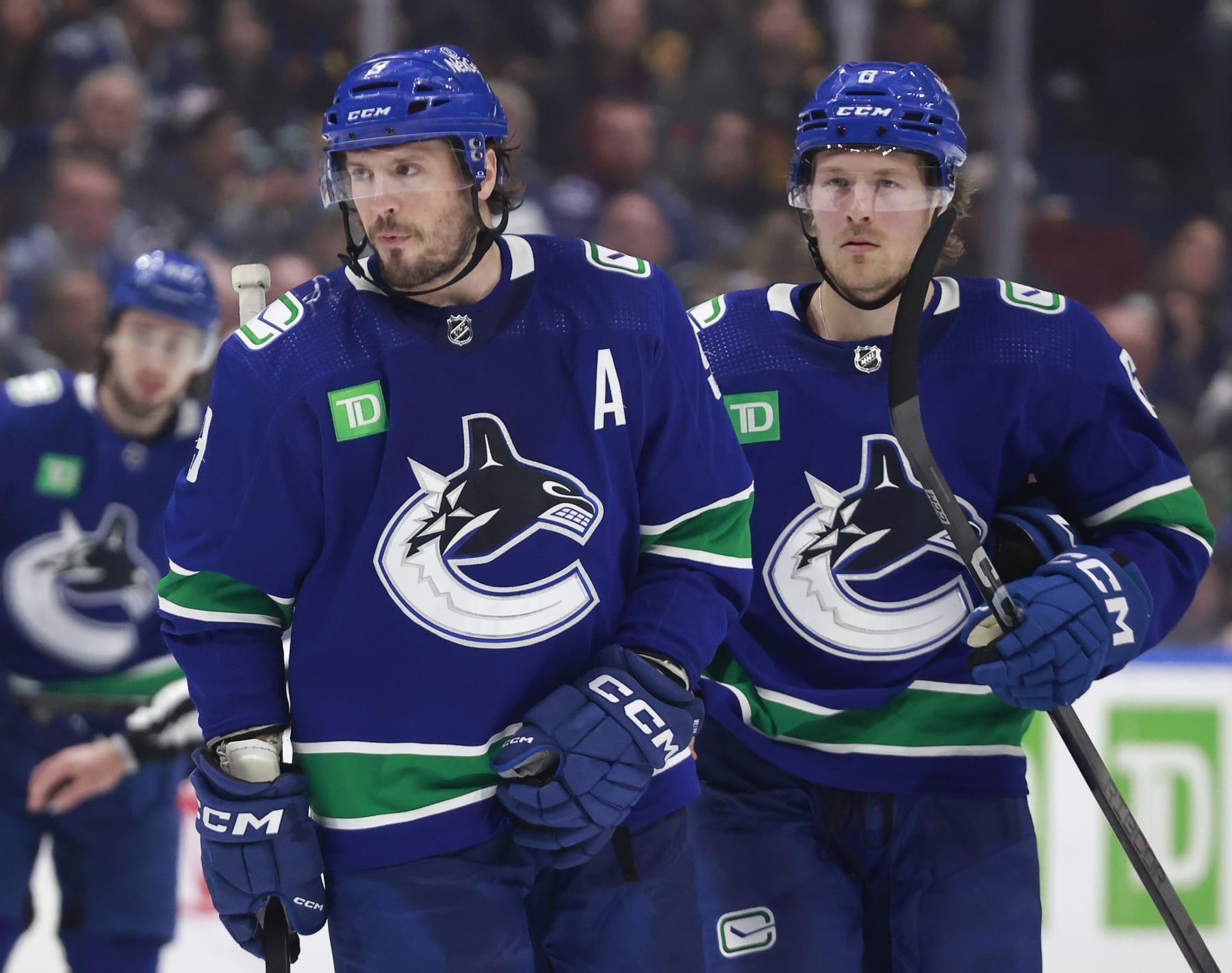 VANCOUVER, CANADA - APRIL 30: J.T. Miller #9 and Brock Boeser #6 of the Vancouver Canucks skate ups ice during Game Five of the First Round of the 2024 Stanley Cup Playoffs against the Nashville Predators at Rogers Arena on April 30, 2024 in Vancouver, British Columbia, Canada.  (Photo by Jeff Vinnick/NHLI via Getty Images)