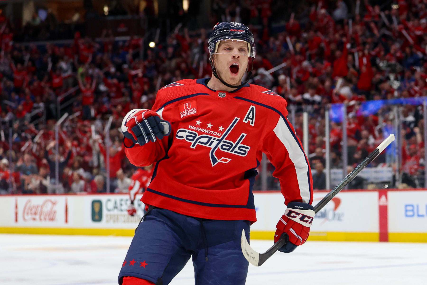 WASHINGTON, DC - APRIL 26: John Carlson #74 of the Washington Capitals celebrates a goal against the New York Rangers in Game Three of the First Round of the 2024 Stanley Cup Playoffs at Capital One Arena on April 26, 2024 in Washington, D.C. (Photo by John McCreary/NHLI via Getty Images)