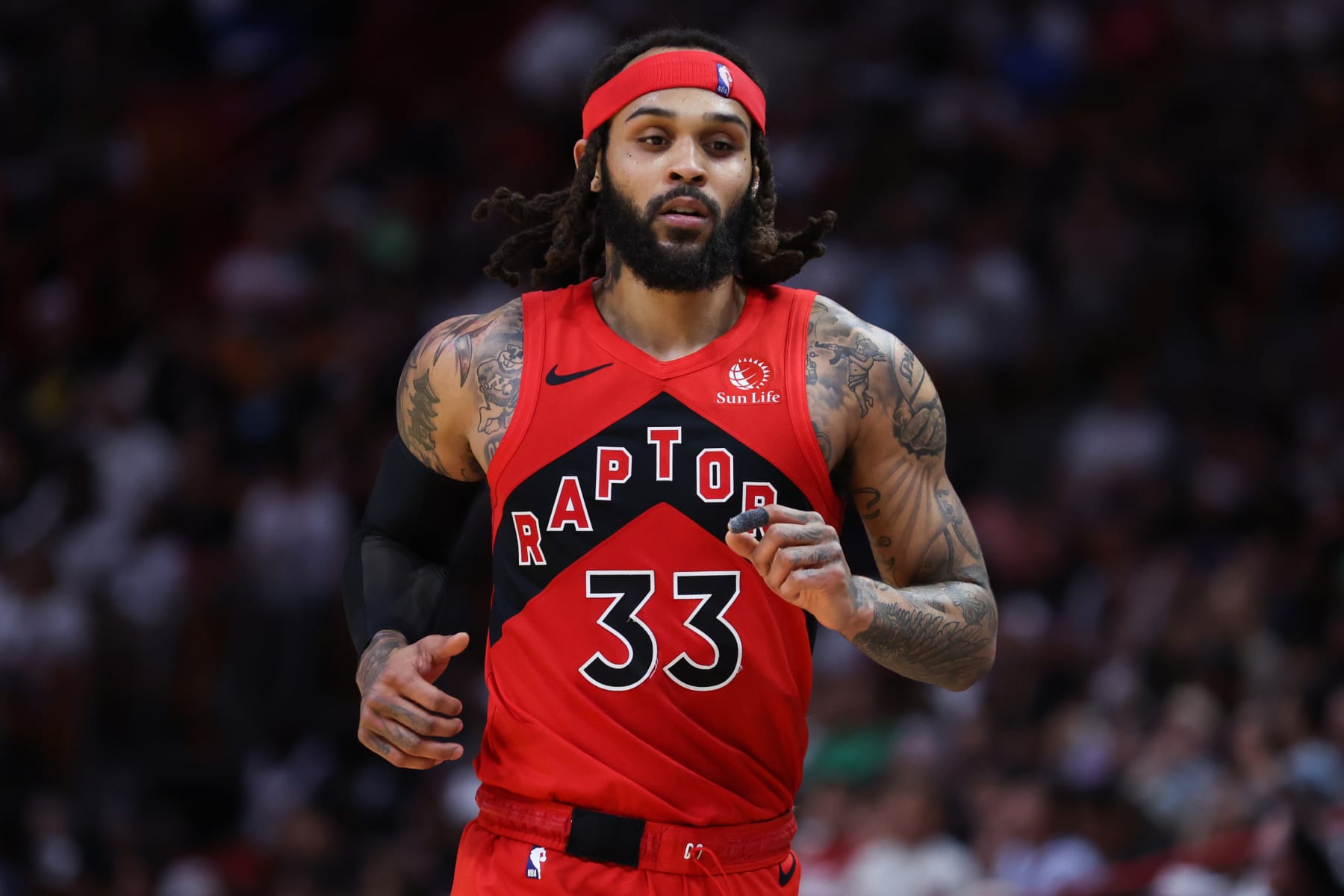 MIAMI, FLORIDA - APRIL 12: Gary Trent Jr. #33 of the Toronto Raptors looks on against the Miami Heat during the third quarter of the game at Kaseya Center on April 12, 2024 in Miami, Florida. NOTE TO USER: User expressly acknowledges and agrees that, by downloading and or using this photograph, User is consenting to the terms and conditions of the Getty Images License Agreement. (Photo by Megan Briggs/Getty Images)