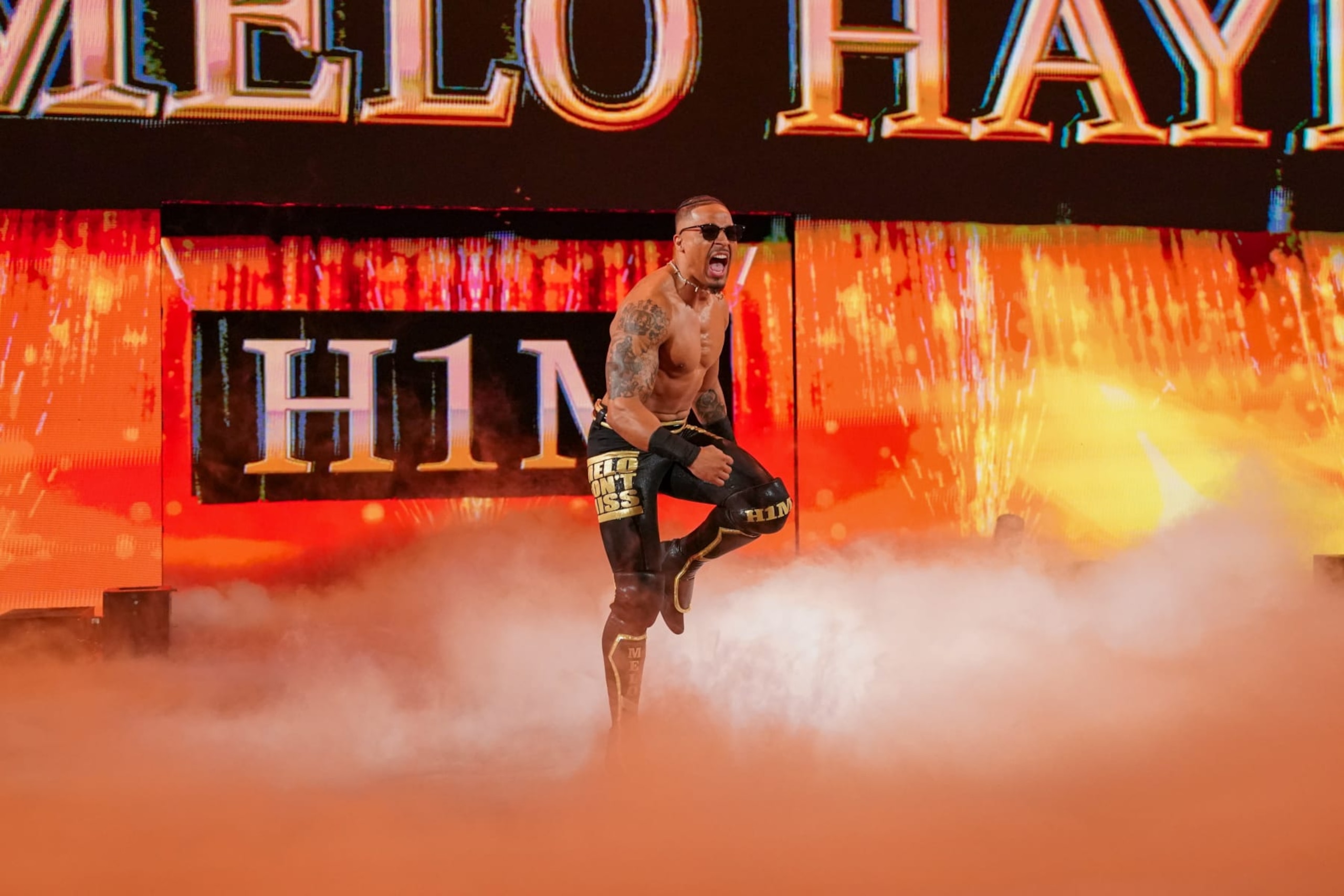 LOUISVILLE, KENTUCKY - JUNE 7: Carmelo Hayes makes his entrance during SmackDown at KFC YUM! Center on June 7, 2024 in Louisville, Kentucky.  (Photo by WWE/Getty Images)