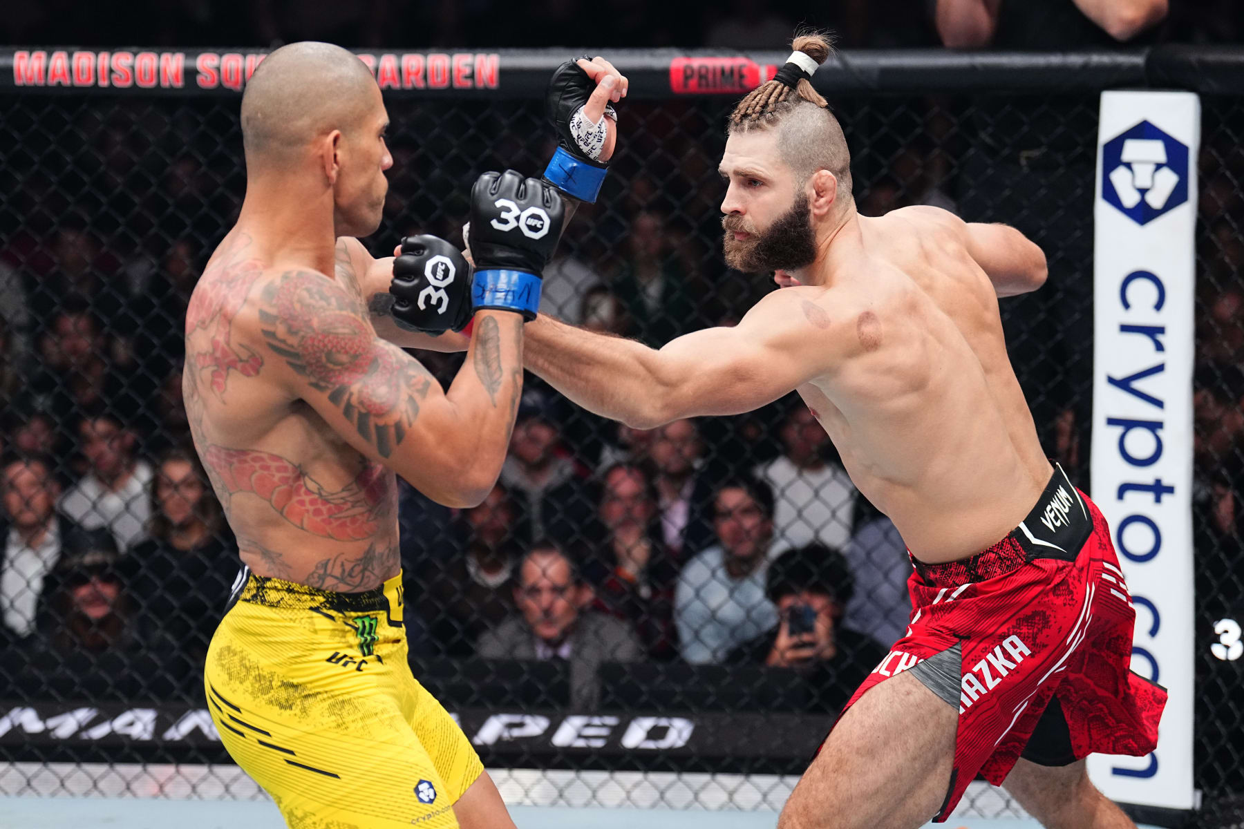 NEW YORK, NEW YORK - NOVEMBER 11: Jiri Prochazka of the Czech Republic punches Alex Pereira of Brazil in the UFC light heavyweight championship fight during the UFC 295 event at Madison Square Garden on November 11, 2023 in New York City. (Photo by Chris Unger/Zuffa LLC via Getty Images)
