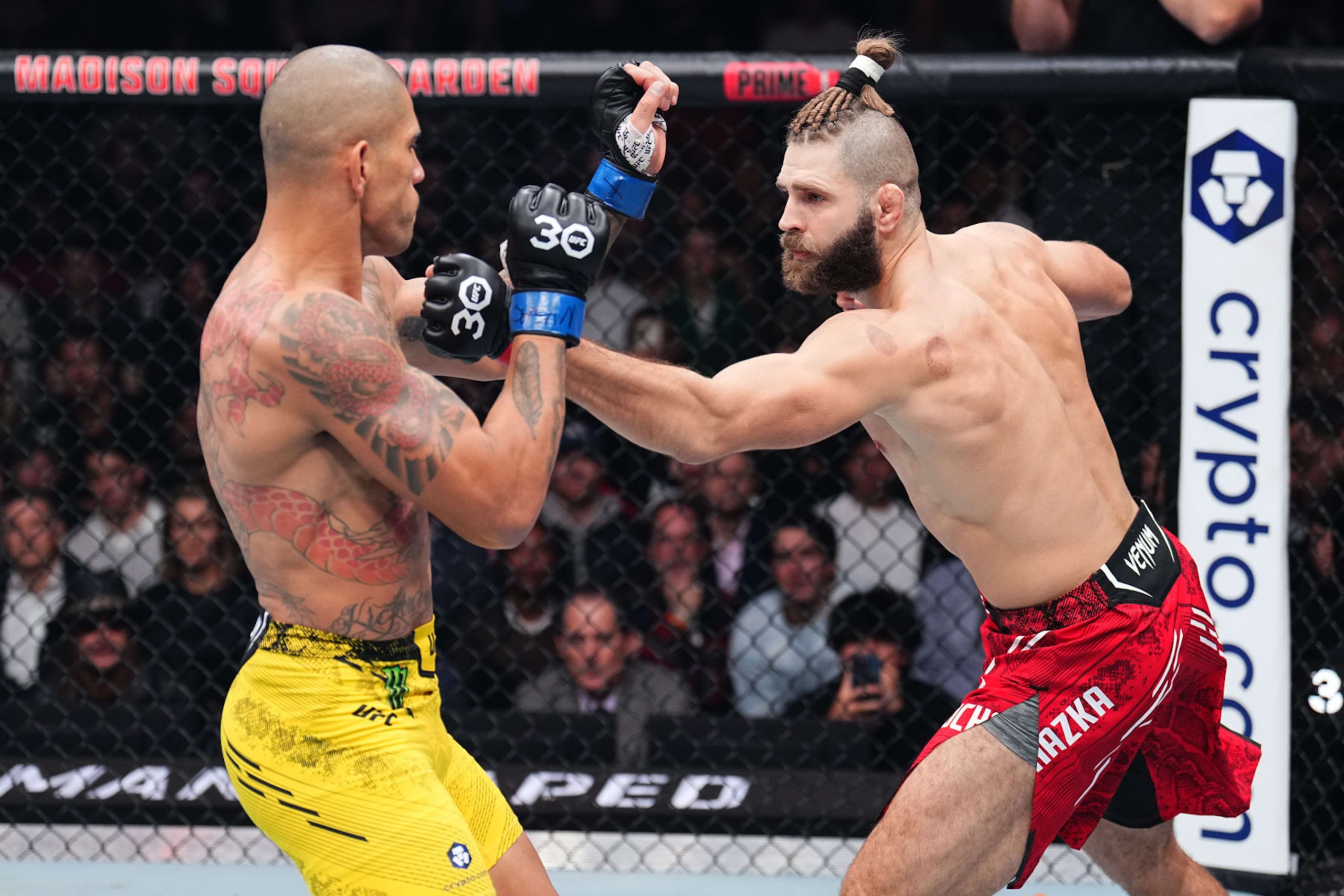 NEW YORK, NEW YORK - NOVEMBER 11: Jiri Prochazka of the Czech Republic punches Alex Pereira of Brazil in the UFC light heavyweight championship fight during the UFC 295 event at Madison Square Garden on November 11, 2023 in New York City. (Photo by Chris Unger/Zuffa LLC via Getty Images)