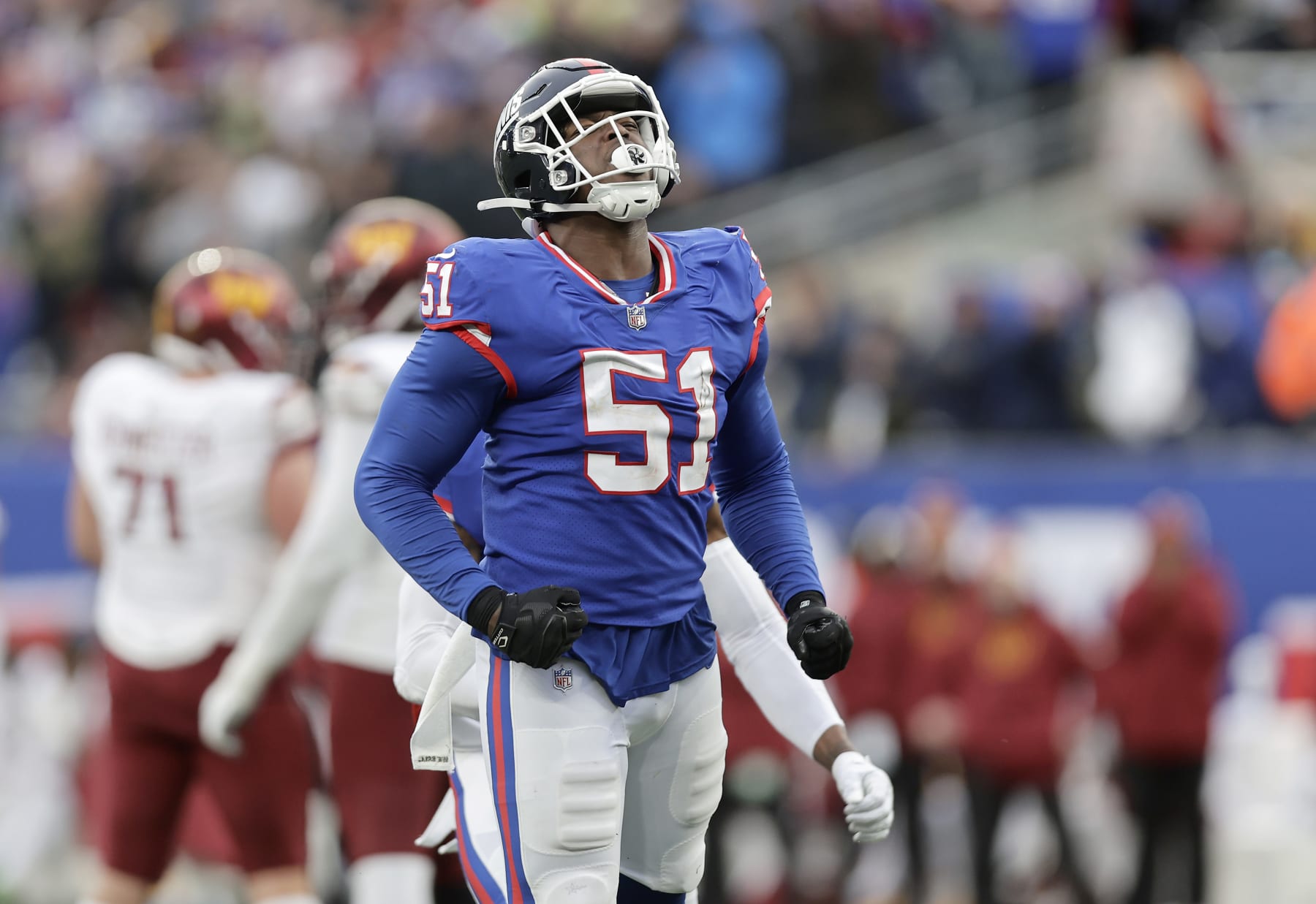 EAST RUTHERFORD, NEW JERSEY - DECEMBER 04: (NEW YORK DAILIES OUT)  Azeez Ojulari #51 of the New York Giants in action against the Washington Commanders at MetLife Stadium on December 04, 2022 in East Rutherford, New Jersey. The game ended in a 20-20 tie. (Photo by Jim McIsaac/Getty Images)