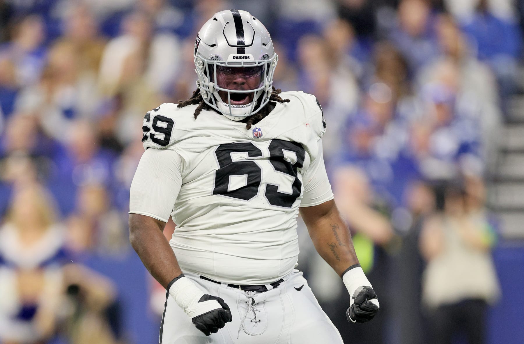 INDIANAPOLIS, INDIANA - DECEMBER 31: Adam Butler #69 of the  Las Vegas Raiders celebrates in the game against the Indianapolis Colts at Lucas Oil Stadium on December 31, 2023 in Indianapolis, Indiana. (Photo by Andy Lyons/Getty Images)