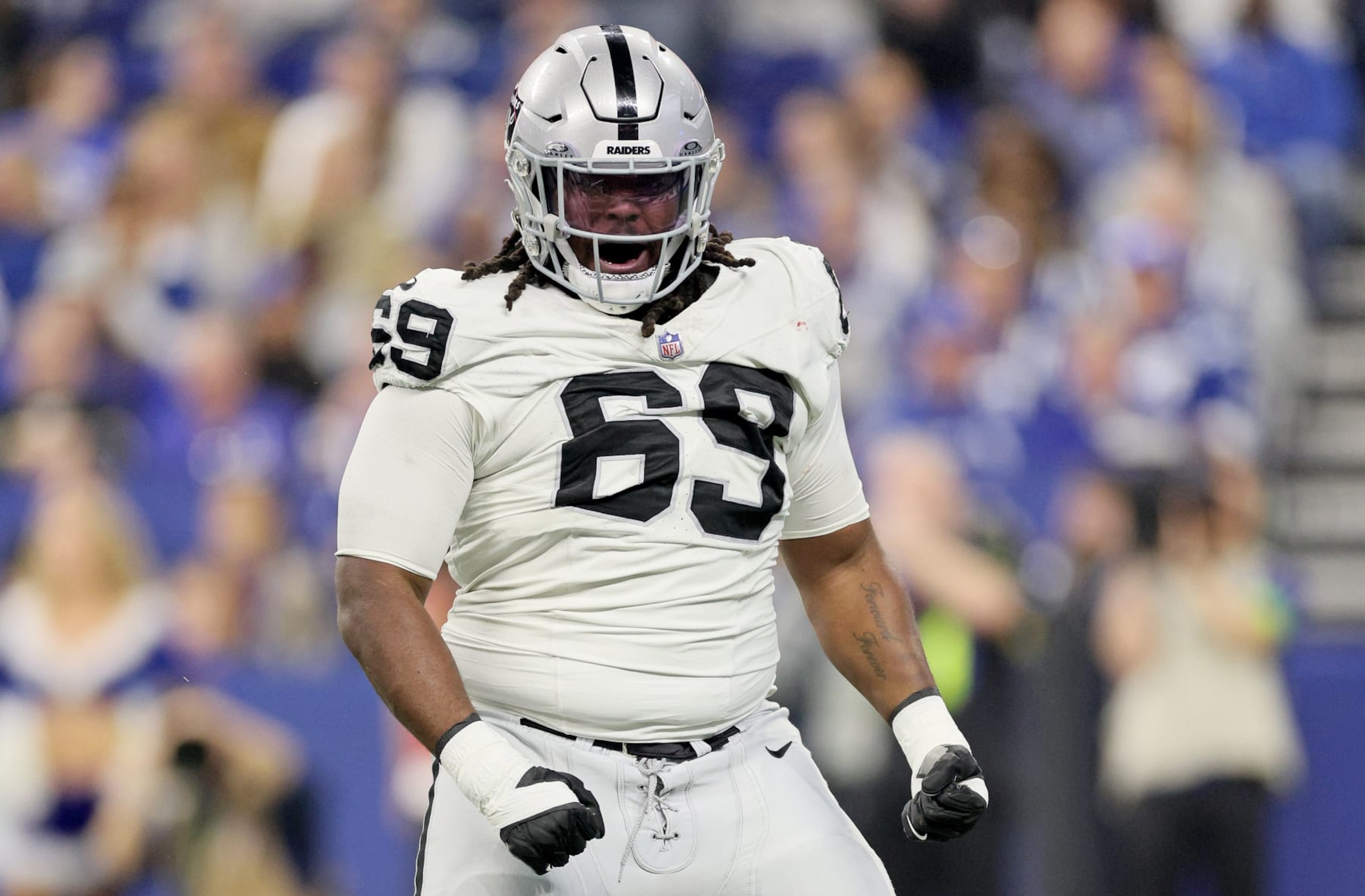 INDIANAPOLIS, INDIANA - DECEMBER 31: Adam Butler #69 of the Las Vegas Raiders celebrates in the game against the Indianapolis Colts at Lucas Oil Stadium on December 31, 2023 in Indianapolis, Indiana. (Photo by Andy Lyons/Getty Images) INDIANAPOLIS, INDIANA - DECEMBER 31: Adam Butler #69 of the Las Vegas Raiders celebrates in the game against the Indianapolis Colts at Lucas Oil Stadium on December 31, 2023 in Indianapolis, Indiana. (Photo by Andy Lyons/Getty Images)