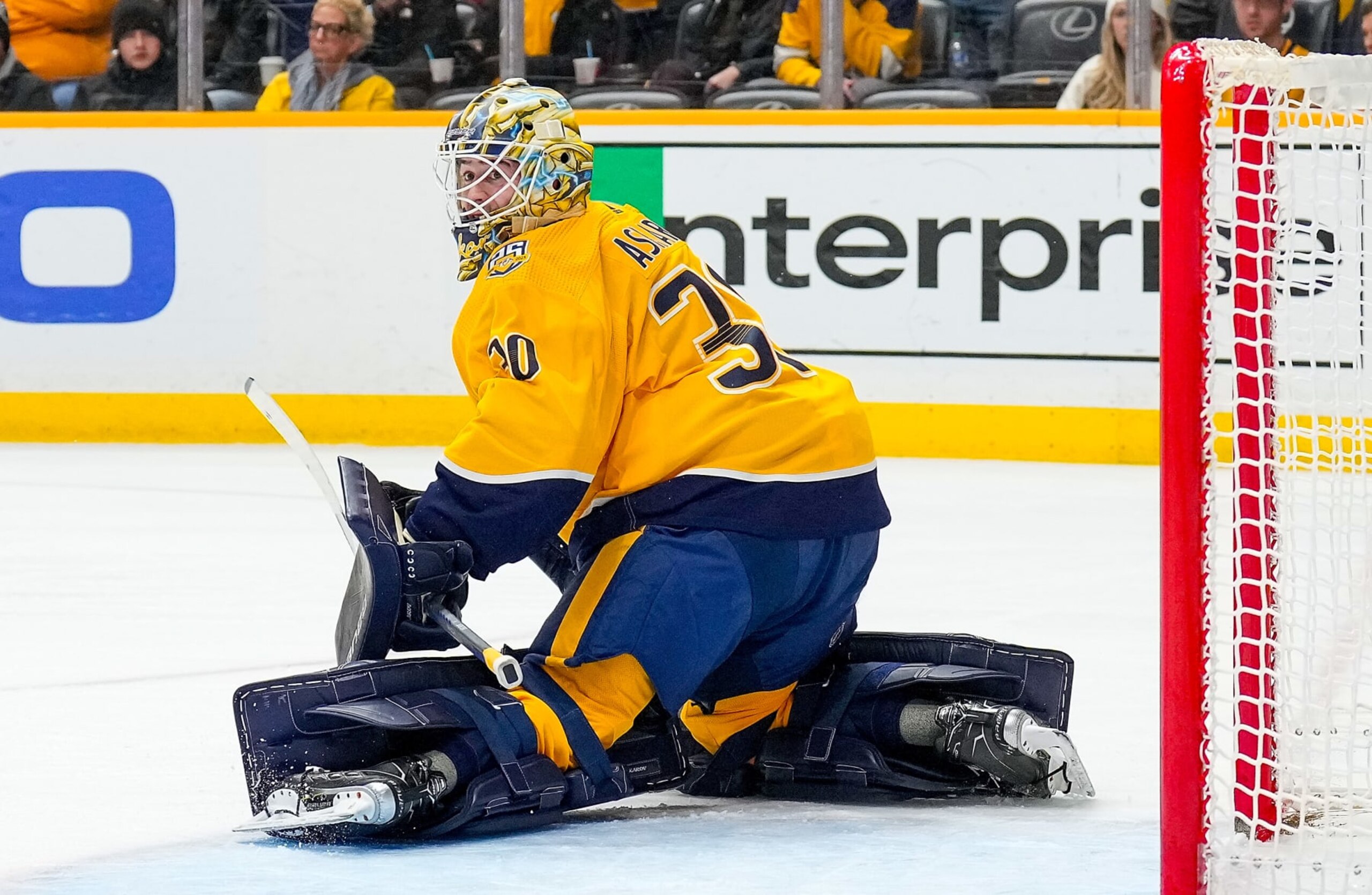 NASHVILLE, TENNESSEE - DECEMBER 27: Yaroslav Askarov #30 of the Nashville Predators tends net against the Carolina Hurricanes during an NHL game at Bridgestone Arena on December 27, 2023 in Nashville, Tennessee. (Photo by John Russell/NHLI via Getty Images) NASHVILLE, TENNESSEE - DECEMBER 27: Yaroslav Askarov #30 of the Nashville Predators tends net against the Carolina Hurricanes during an NHL game at Bridgestone Arena on December 27, 2023 in Nashville, Tennessee. (Photo by John Russell/NHLI via Getty Images)