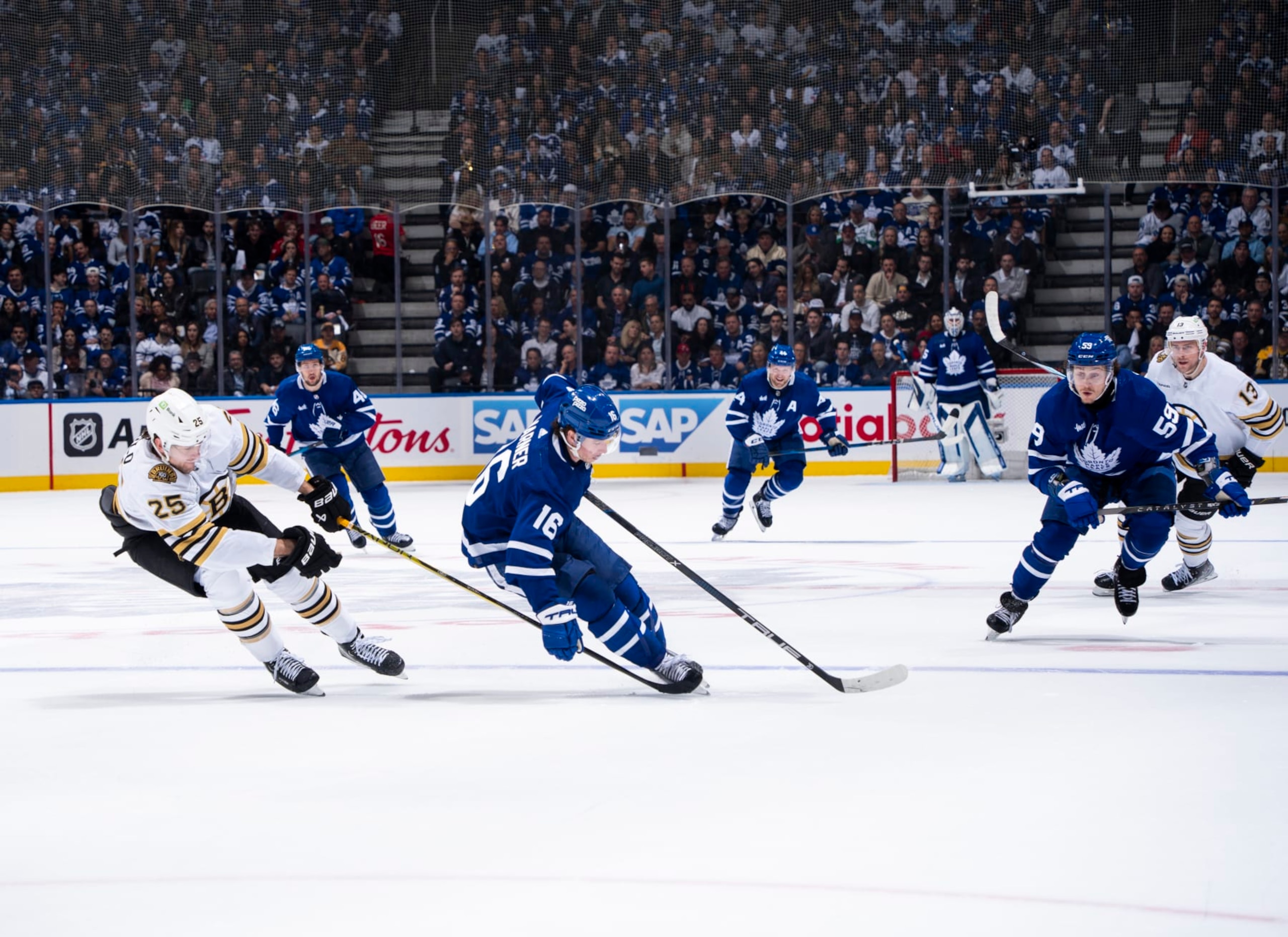 TORONTO, ON - APRIL 27: Mitchell Marner #16 of the Toronto Maple Leafs skates against Brandon Carlo #25 of the Boston Bruins during the first period in Game Four of the First Round of the 2024 Stanley Cup Playoffs at Scotiabank Arena on April 27, 2024 in Toronto, Ontario, Canada. (Photo by Mark Blinch/NHLI via Getty Images) TORONTO, ON - APRIL 27: Mitchell Marner #16 of the Toronto Maple Leafs skates against Brandon Carlo #25 of the Boston Bruins during the first period in Game Four of the First Round of the 2024 Stanley Cup Playoffs at Scotiabank Arena on April 27, 2024 in Toronto, Ontario, Canada. (Photo by Mark Blinch/NHLI via Getty Images)