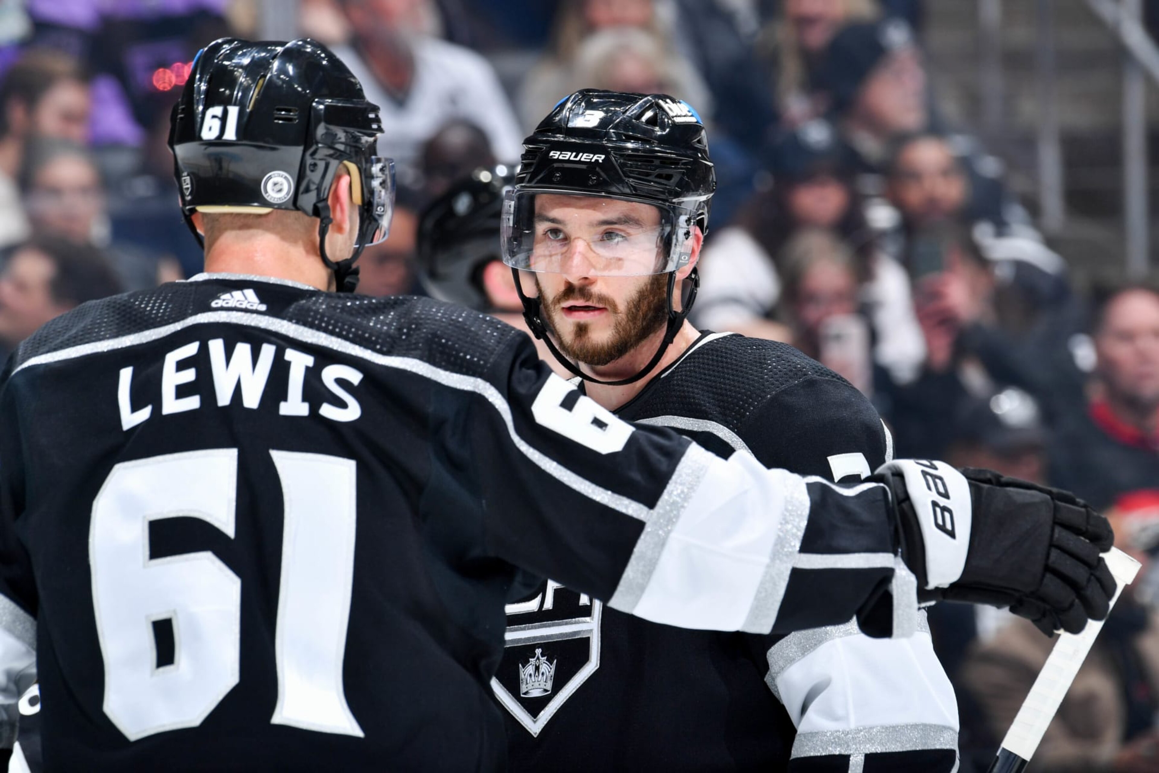 LOS ANGELES, CA - APRIL 18: Trevor Lewis #61 of the Los Angeles Kings and Matt Roy #3 meet on the ice during the second period against the Chicago Blackhawks at Crypto.com Arena on April 18, 2024 in Los Angeles, California. (Photo by Juan Ocampo/NHLI via Getty Images) LOS ANGELES, CA - APRIL 18: Trevor Lewis #61 of the Los Angeles Kings and Matt Roy #3 meet on the ice during the second period against the Chicago Blackhawks at Crypto.com Arena on April 18, 2024 in Los Angeles, California. (Photo by Juan Ocampo/NHLI via Getty Images)