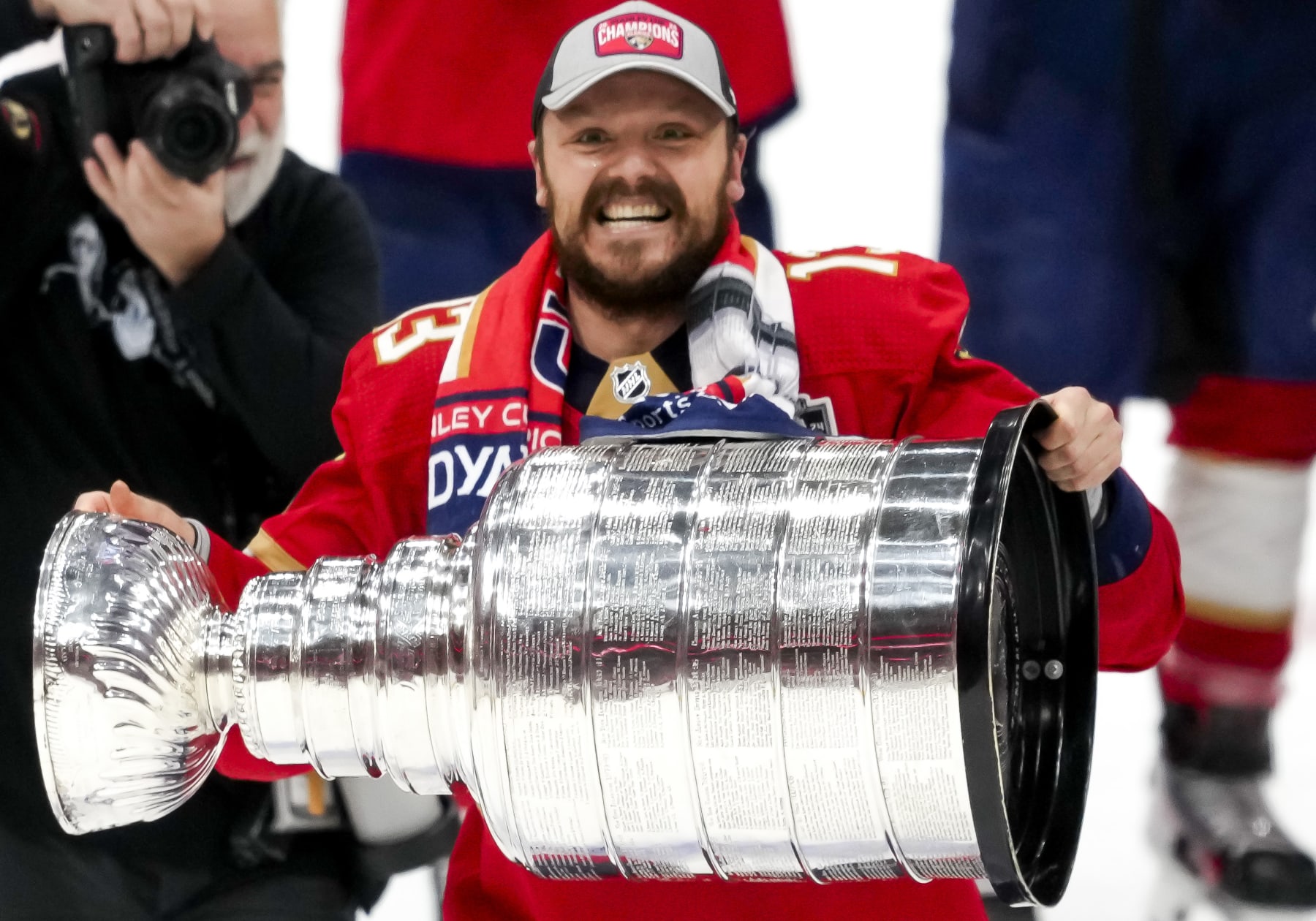 SUNRISE, FL - JUNE 24:  Florida Panthers center Sam Reinhart (13) raises the Stanley Cup  during the NHL Stanley Cup Finals, Game 7 between the Florida Panthers and Edmonton Oilers on June 24th, 2024 at Amerant Bank Arena in Sunrise, FL. (Photo by Andrew Bershaw/Icon Sportswire via Getty Images)