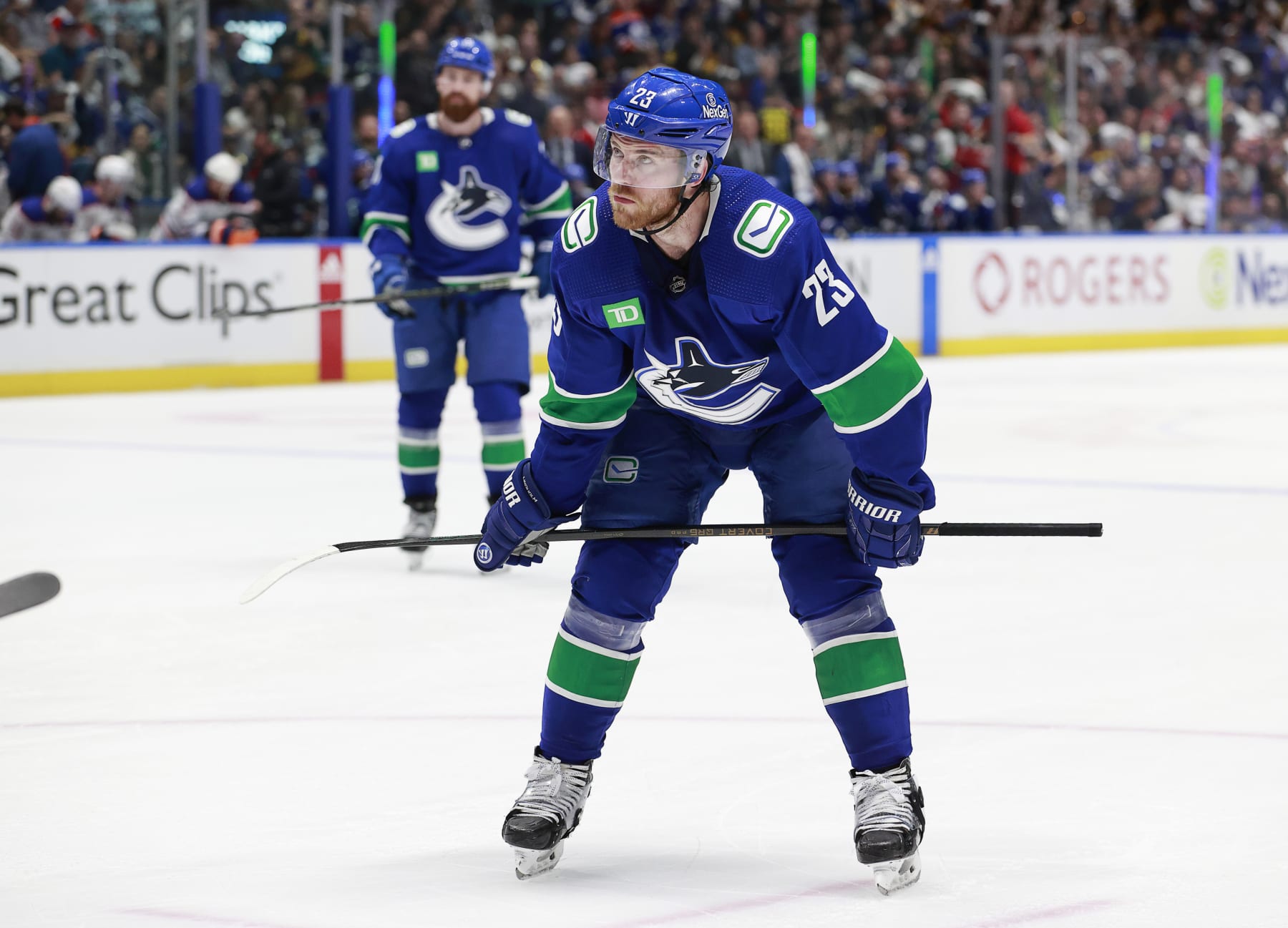 VANCOUVER, CANADA - MAY 10: Elias Lindholm #23 of the Vancouver Canucks lines up for a face off in Game Two of the Second Round of the 2024 Stanley Cup Playoffs against the Edmonton Oilers at Rogers Arena on May 10, 2024 in Vancouver, British Columbia, Canada.  (Photo by Jeff Vinnick/NHLI via Getty Images)
