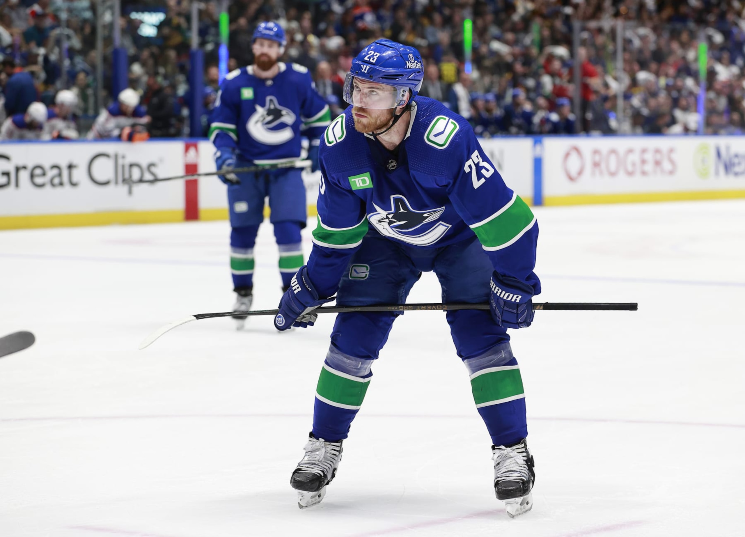 VANCOUVER, CANADA - MAY 10: Elias Lindholm #23 of the Vancouver Canucks lines up for a face off in Game Two of the Second Round of the 2024 Stanley Cup Playoffs against the Edmonton Oilers at Rogers Arena on May 10, 2024 in Vancouver, British Columbia, Canada. (Photo by Jeff Vinnick/NHLI via Getty Images) VANCOUVER, CANADA - MAY 10: Elias Lindholm #23 of the Vancouver Canucks lines up for a face off in Game Two of the Second Round of the 2024 Stanley Cup Playoffs against the Edmonton Oilers at Rogers Arena on May 10, 2024 in Vancouver, British Columbia, Canada. (Photo by Jeff Vinnick/NHLI via Getty Images)