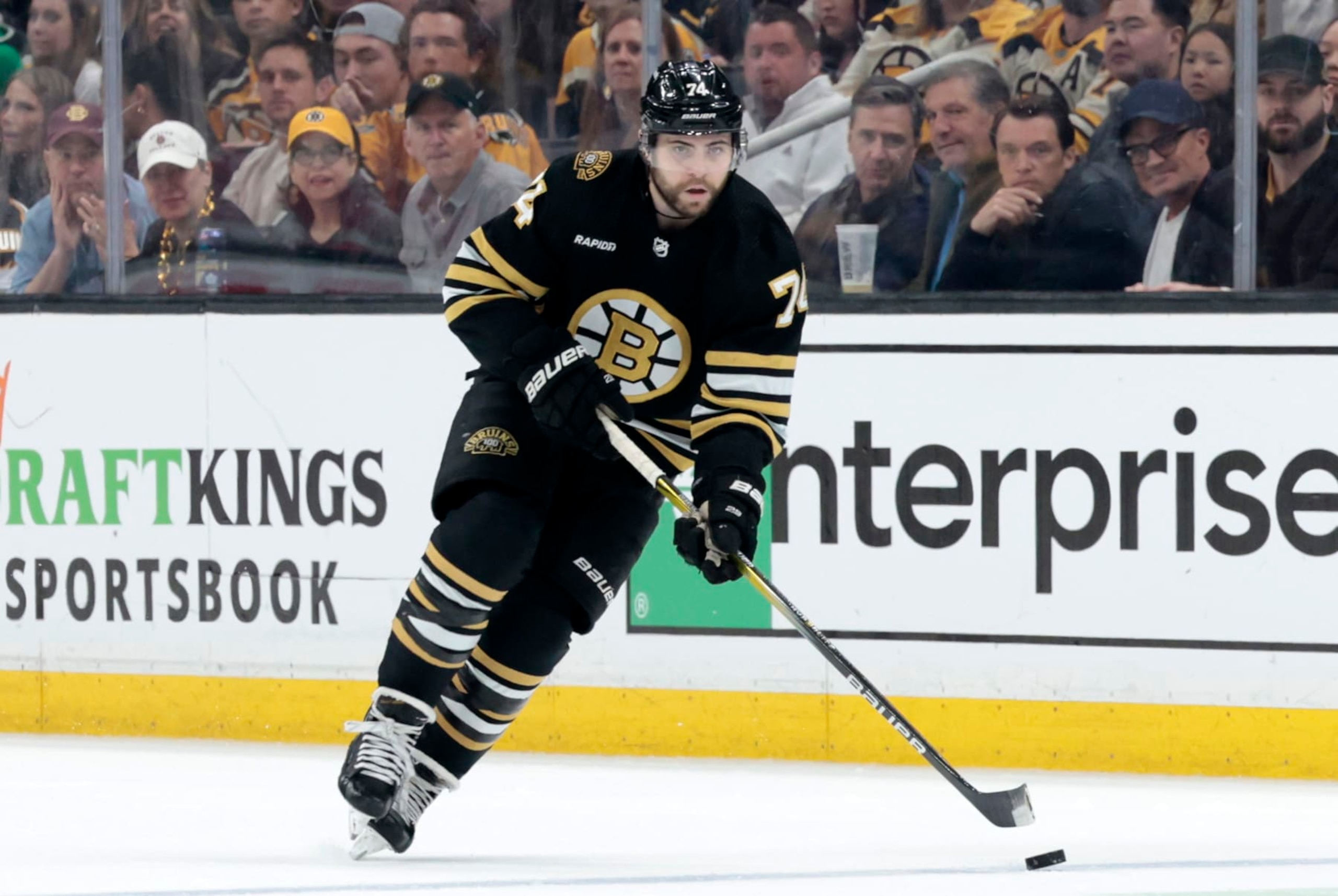 BOSTON, MA - MAY 17: Boston Bruins left wing Jake DeBrusk (74) carries the puck during Game 6 of the Eastern Conference Second Round playoffs between the Boston Bruins and the Florida Panthers on May 17, 2024, at TD Garden in Boston, Massachusetts.(Photo by Fred Kfoury III/Icon Sportswire via Getty Images) BOSTON, MA - MAY 17: Boston Bruins left wing Jake DeBrusk (74) carries the puck during Game 6 of the Eastern Conference Second Round playoffs between the Boston Bruins and the Florida Panthers on May 17, 2024, at TD Garden in Boston, Massachusetts.(Photo by Fred Kfoury III/Icon Sportswire via Getty Images)