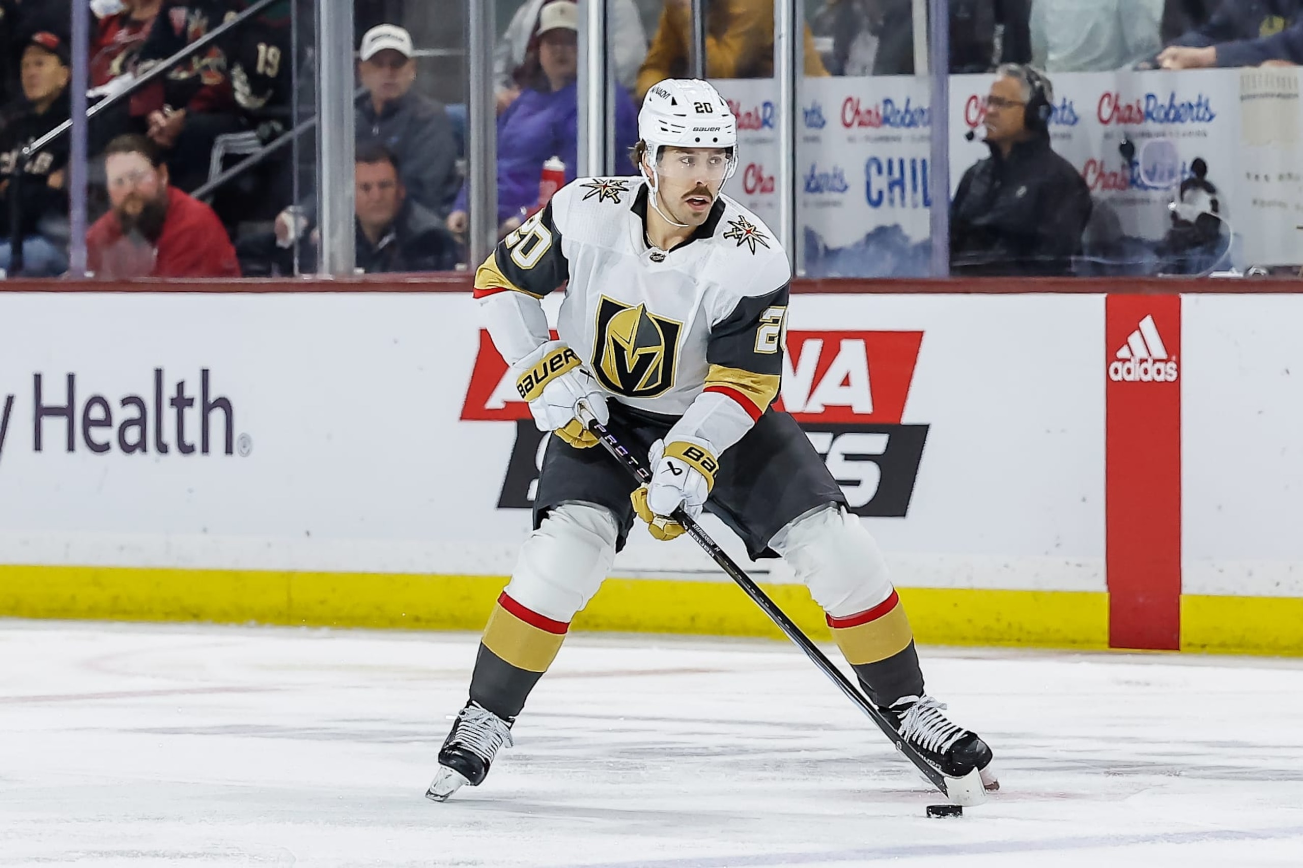 TEMPE, AZ - APRIL 05: Vegas Golden Knights center Chandler Stephenson (20) controls the puck during the NHL hockey game between the Vegas Golden Knights and the Arizona Coyotes on April 5, 2024 at Mullet Arena in Tempe, Arizona. (Photo by Kevin Abele/Icon Sportswire via Getty Images) TEMPE, AZ - APRIL 05: Vegas Golden Knights center Chandler Stephenson (20) controls the puck during the NHL hockey game between the Vegas Golden Knights and the Arizona Coyotes on April 5, 2024 at Mullet Arena in Tempe, Arizona. (Photo by Kevin Abele/Icon Sportswire via Getty Images)