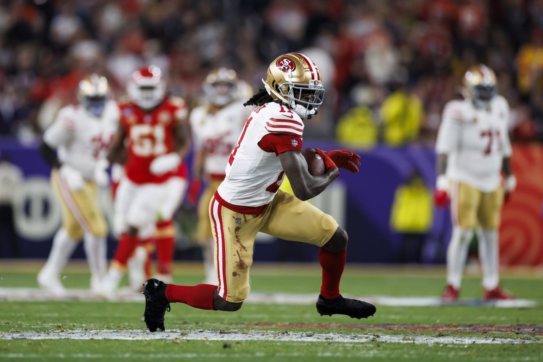LAS VEGAS, NEVADA - FEBRUARY 11: Brandon Aiyuk #11 of the San Francisco 49ers runs the ball after a catch during Super Bowl LVIII against the Kansas City Chiefs at Allegiant Stadium on February 11, 2024 in Las Vegas, Nevada. (Photo by Ryan Kang/Getty Images)