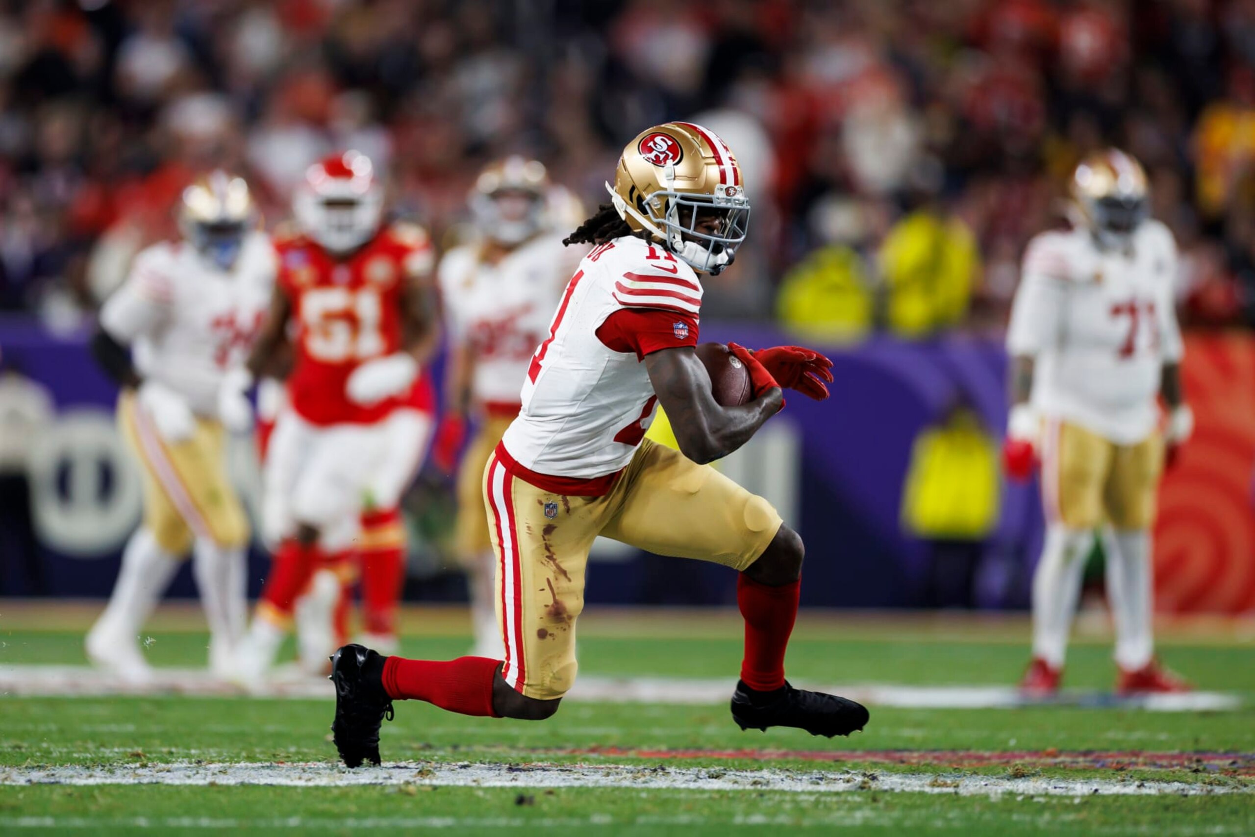LAS VEGAS, NEVADA - FEBRUARY 11: Brandon Aiyuk #11 of the San Francisco 49ers runs the ball after a catch during Super Bowl LVIII against the Kansas City Chiefs at Allegiant Stadium on February 11, 2024 in Las Vegas, Nevada. (Photo by Ryan Kang/Getty Images)