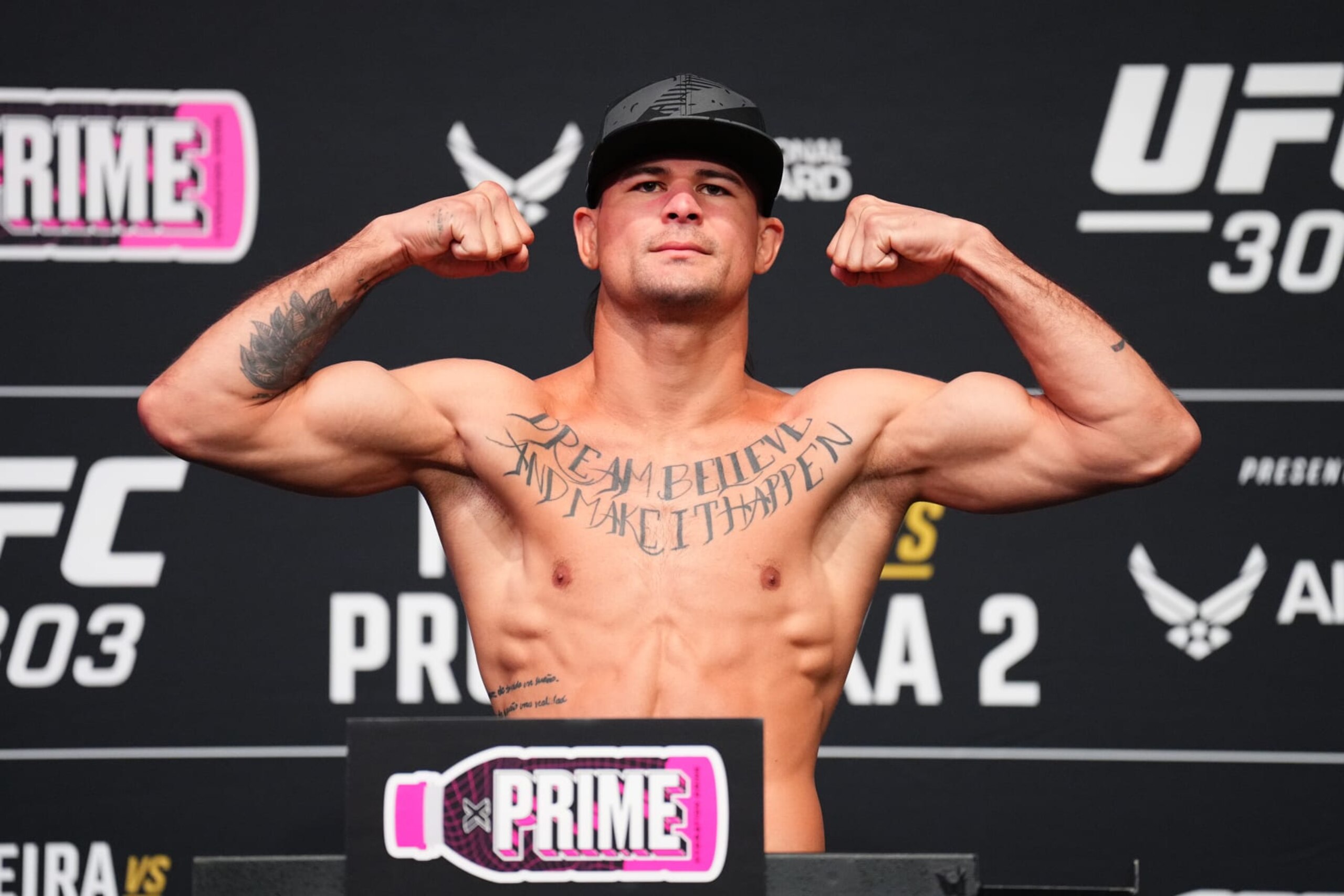LAS VEGAS, NEVADA - JUNE 28:  Diego Lopes of Brazil poses on the scale during the UFC 303 official weigh-ins at UFC Apex on June 28, 2024 in Las Vegas, Nevada. (Photo by Chris Unger/Zuffa LLC via Getty Images)