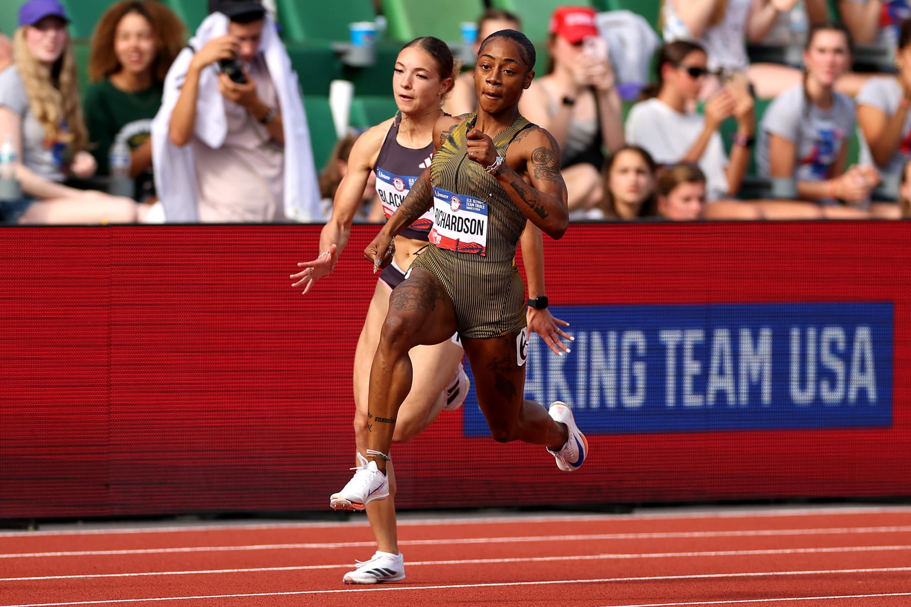 EUGENE, OREGON - JUNE 27: Kennedy Blackmon and Sha'Carri Richardson compete in the first round of the women's 200 meters on Day Seven of the 2024 U.S. Olympic Team Track & Field Trials at Hayward Field on June 27, 2024 in Eugene, Oregon. (Photo by Patrick Smith/Getty Images)