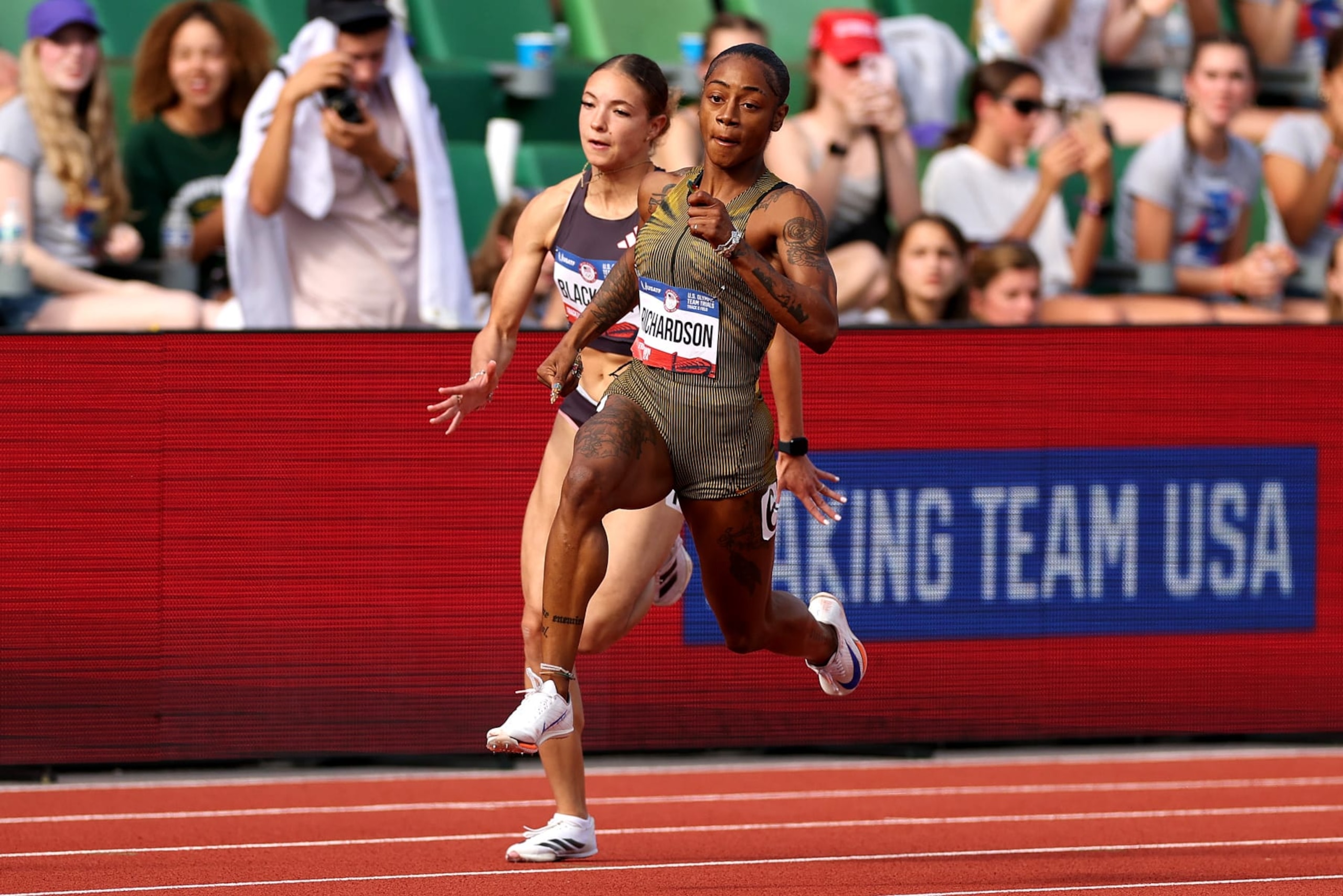 EUGENE, OREGON - JUNE 27: Kennedy Blackmon and Sha'Carri Richardson compete in the first round of the women's 200 meters on Day Seven of the 2024 U.S. Olympic Team Track & Field Trials at Hayward Field on June 27, 2024 in Eugene, Oregon. (Photo by Patrick Smith/Getty Images) EUGENE, OREGON - JUNE 27: Kennedy Blackmon and Sha'Carri Richardson compete in the first round of the women's 200 meters on Day Seven of the 2024 U.S. Olympic Team Track & Field Trials at Hayward Field on June 27, 2024 in Eugene, Oregon. (Photo by Patrick Smith/Getty Images)