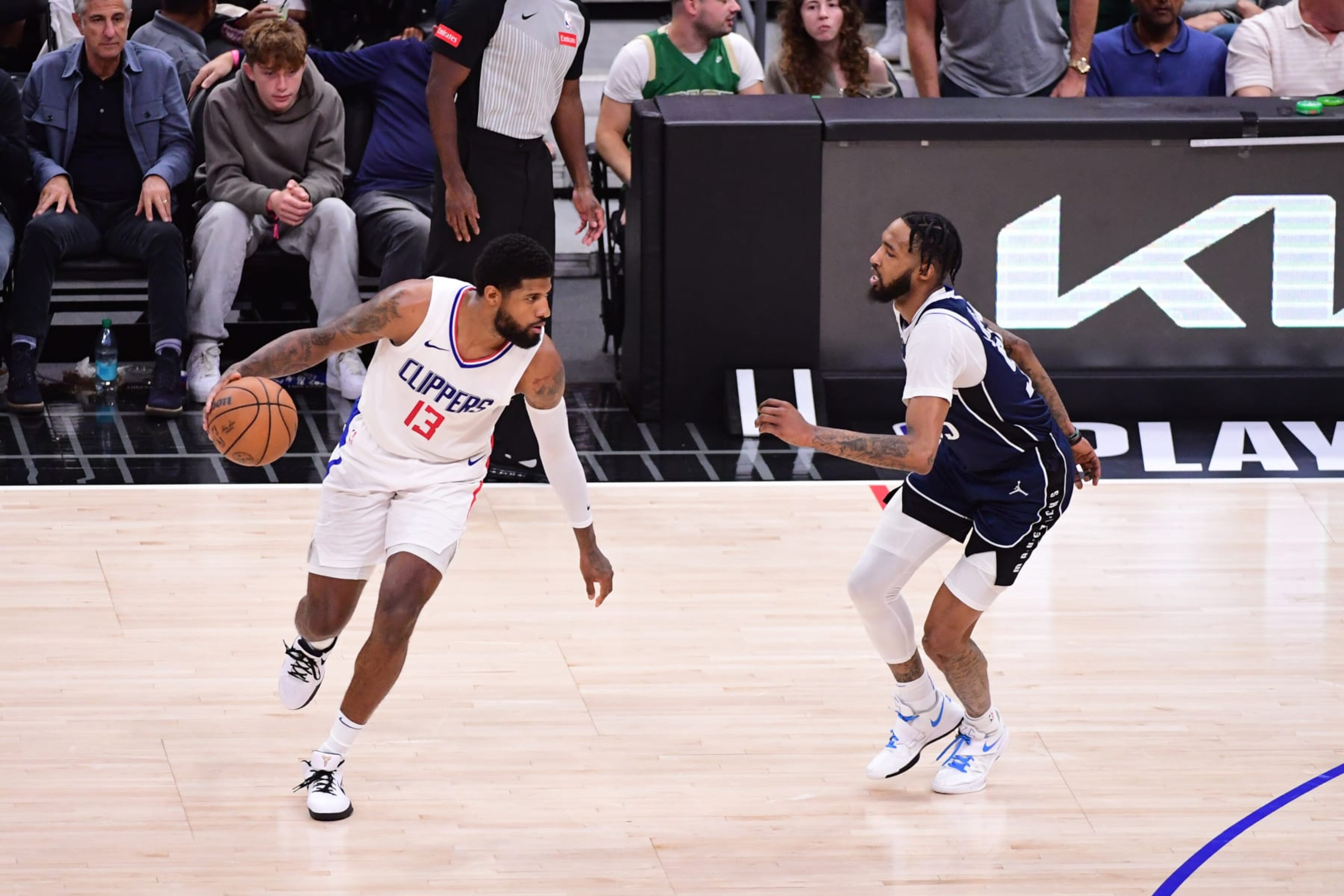 LOS ANGELES, CA - MAY 1: Paul George #13 of the LA Clippers handles the ball during the game against the Dallas Mavericks during Round 1 Game 5 of the 2024 NBA Playoffs on May 1, 2024 at Crypto.Com Arena in Los Angeles, California. NOTE TO USER: User expressly acknowledges and agrees that, by downloading and/or using this Photograph, user is consenting to the terms and conditions of the Getty Images License Agreement. Mandatory Copyright Notice: Copyright 2024 NBAE (Photo by Adam Pantozzi/NBAE via Getty Images) LOS ANGELES, CA - MAY 1: Paul George #13 of the LA Clippers handles the ball during the game against the Dallas Mavericks during Round 1 Game 5 of the 2024 NBA Playoffs on May 1, 2024 at Crypto.Com Arena in Los Angeles, California. NOTE TO USER: User expressly acknowledges and agrees that, by downloading and/or using this Photograph, user is consenting to the terms and conditions of the Getty Images License Agreement. Mandatory Copyright Notice: Copyright 2024 NBAE (Photo by Adam Pantozzi/NBAE via Getty Images)