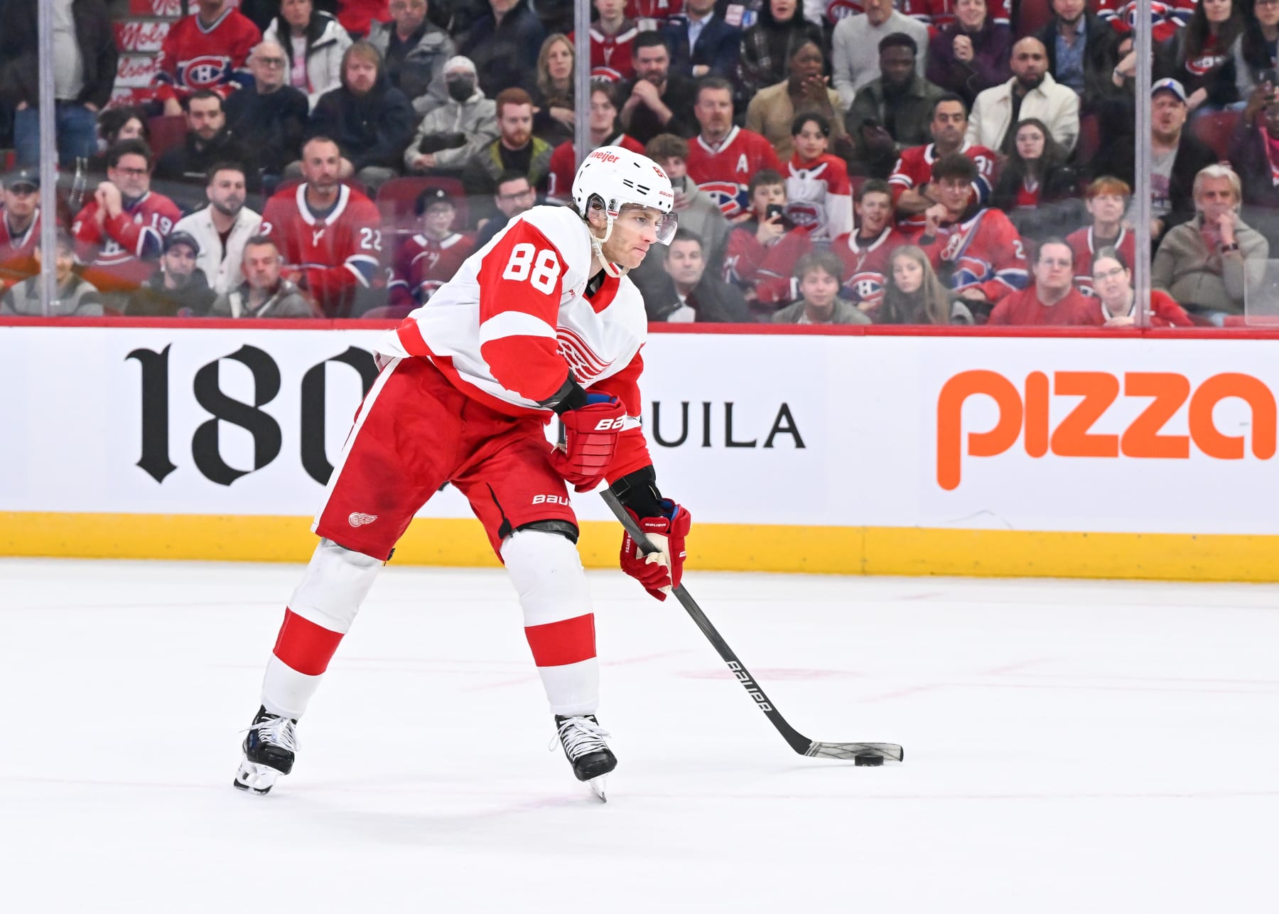 MONTREAL, CANADA - APRIL 16:  Patrick Kane #88 of the Detroit Red Wings makes his approach with the puck during the shootout against the Montreal Canadiens at the Bell Centre on April 16, 2024 in Montreal, Quebec, Canada.  The Detroit Red Wings defeated the Montreal Canadiens 5-4 in a shootout.  (Photo by Minas Panagiotakis/Getty Images)