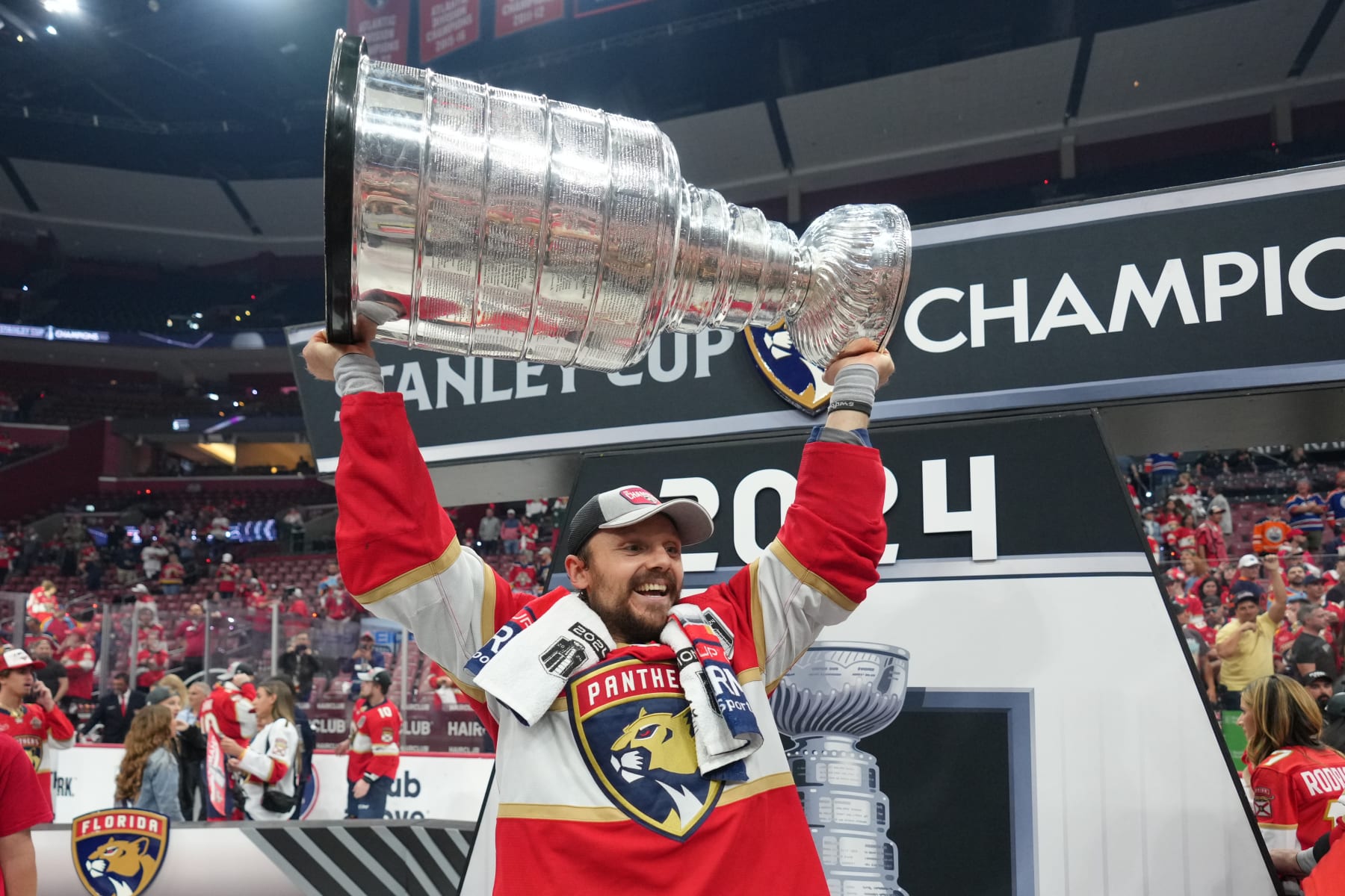 SUNRISE, FL - JUNE 24: Florida Panthers center Sam Reinhart (13) hols up the Stanley Cup following game seven of the Stanley Cup Finals between the Edmonton Oilers and the Florida Panthers on Monday, June 24, 2024  at Amerant Bank Arena in Sunrise, Fla. (Photo by Peter Joneleit/Icon Sportswire via Getty Images)