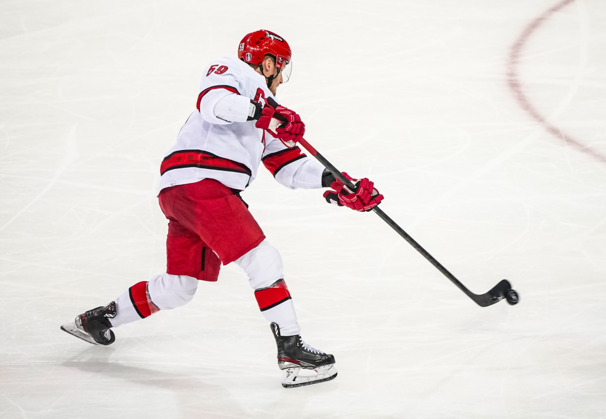 NEW YORK, NEW YORK - MAY 07: Jake Guentzel #59 of the Carolina Hurricanes shoots the puck during the second period against the New York Rangers in Game Two of the Second Round of the 2024 Stanley Cup Playoffs at Madison Square Garden on May 07, 2024 in New York City.  (Photo by Josh Lavallee/NHLI via Getty Images)
