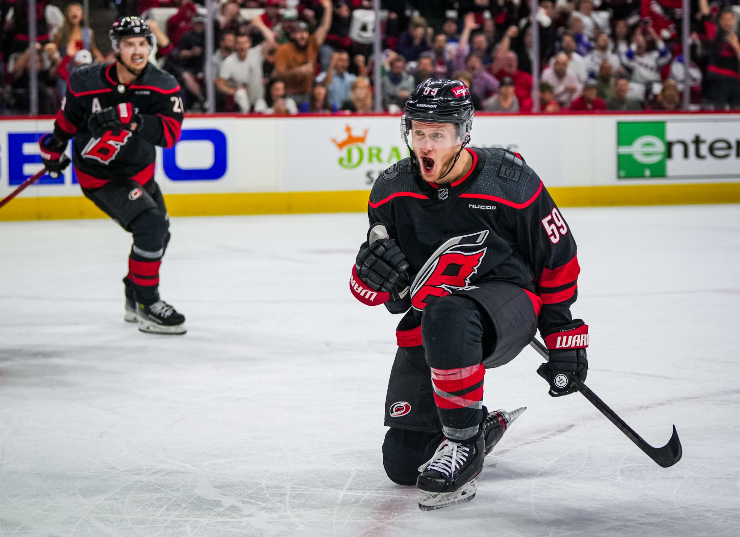 RALEIGH, NORTH CAROLINA - MAY 09: Jake Guentzel #59 of the Carolina Hurricanes celebrates his goal against the New York Rangers during the first period in Game Three of the Second Round of the 2024 Stanley Cup Playoffs at PNC Arena on May 09, 2024 in Raleigh, North Carolina.  (Photo by Josh Lavallee/NHLI via Getty Images)