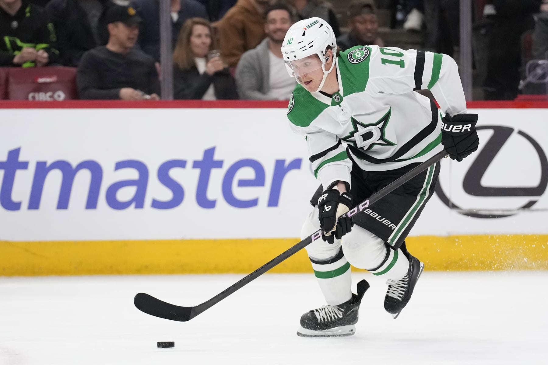 CHICAGO, ILLINOIS - APRIL 06: Ty Dellandrea #10 of the Dallas Stars skates with the puck during the second period against the Chicago Blackhawks at the United Center on April 06, 2024 in Chicago, Illinois. (Photo by Patrick McDermott/Getty Images)
