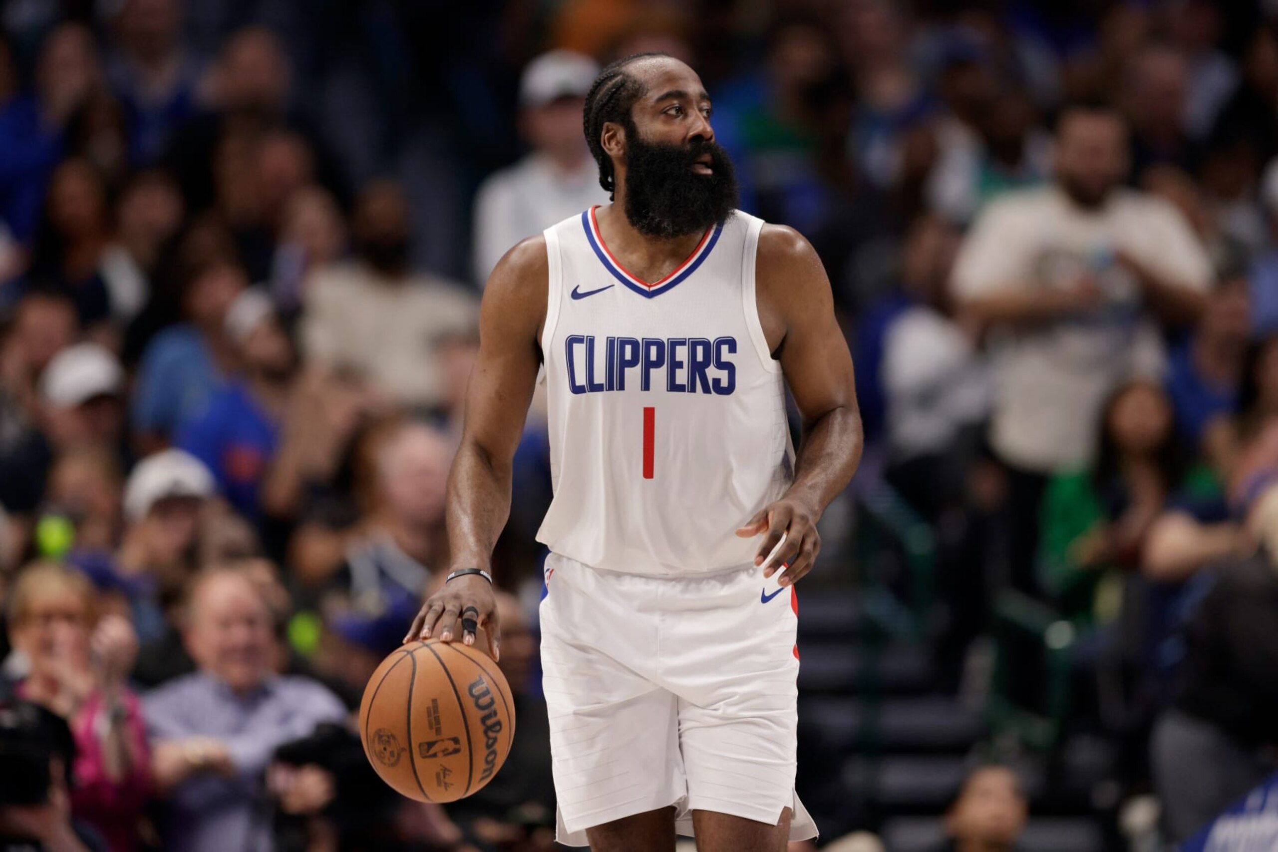 DALLAS, TEXAS - APRIL 28: James Harden #1 of the Los Angeles Clippers brings the ball up court in the second half of game four of the Western Conference First Round Playoffs against the Dallas Mavericks at American Airlines Center on April 28, 2024 in Dallas, Texas.  NOTE TO USER: User expressly acknowledges and agrees that, by downloading and or using this photograph, User is consenting to the terms and conditions of the Getty Images License Agreement. (Photo by Tim Warner/Getty Images)
