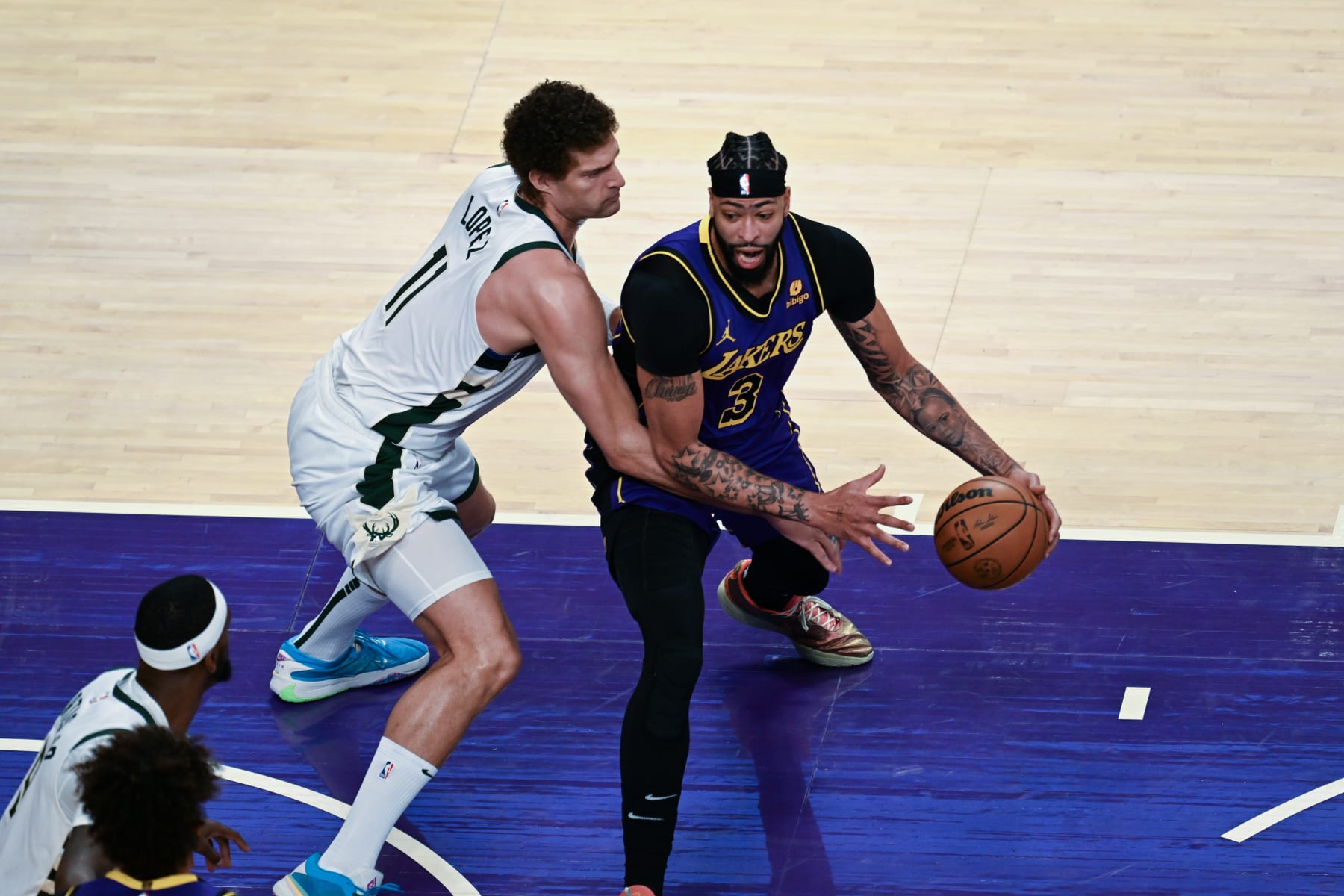 SAN FRANCISCO, CA - MARCH 8: Brook Lopez (11) of Milwaukee Bucks in action against Anthony Davis (3) of Los Angeles Lakers during NBA game between Milwaukee Bucks and Los Angeles Lakers at the Crypto.com Arena on March 8, 2024 in Los Angeles, California, United States. (Photo by Tayfun Coskun/Anadolu via Getty Images)
