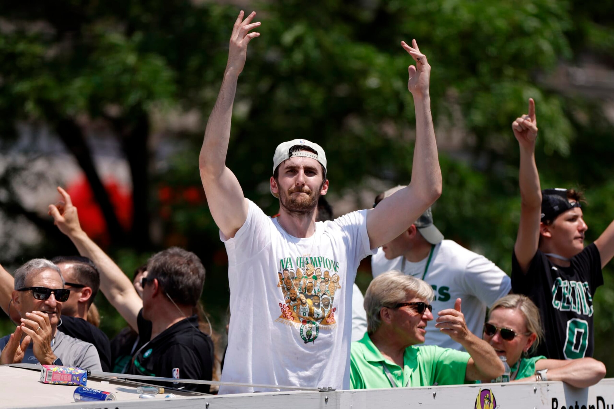 Boston, MA - June 21: Boston Celtics center Luke Kornet waves to the crowd at Copley Square during a duck boat parade to celebrate the 18th Boston Celtics NBA championship. (Photo by Danielle Parhizkaran/The Boston Globe via Getty Images) Boston, MA - June 21: Boston Celtics center Luke Kornet waves to the crowd at Copley Square during a duck boat parade to celebrate the 18th Boston Celtics NBA championship. (Photo by Danielle Parhizkaran/The Boston Globe via Getty Images)