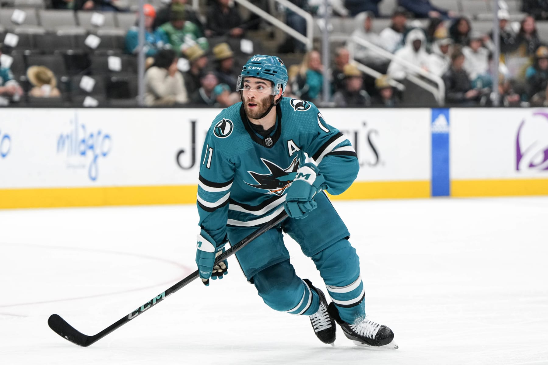 SAN JOSE, CALIFORNIA - APRIL 6: Luke Kunin #11 of the San Jose Sharks skating with the puck in the first period against the St. Louis Blues at SAP Center on April 6, 2024 in San Jose, California. (Photo by Andreea Cardani/NHLI via Getty Images)