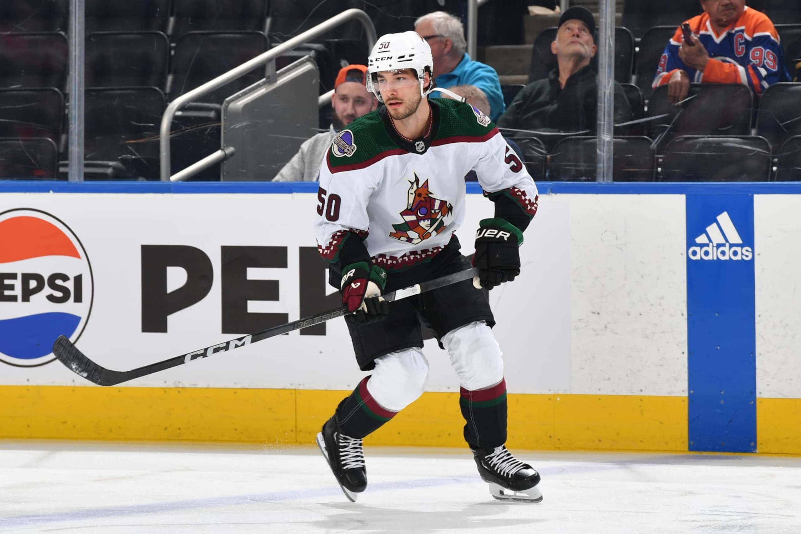 EDMONTON, CANADA - APRIL 12: Sean Durzi #50 of the Arizona Coyotes warms up before the game against the Edmonton Oilers at Rogers Place on April 12, 2024, in Edmonton, Alberta, Canada. (Photo by Andy Devlin/NHLI via Getty Images)
