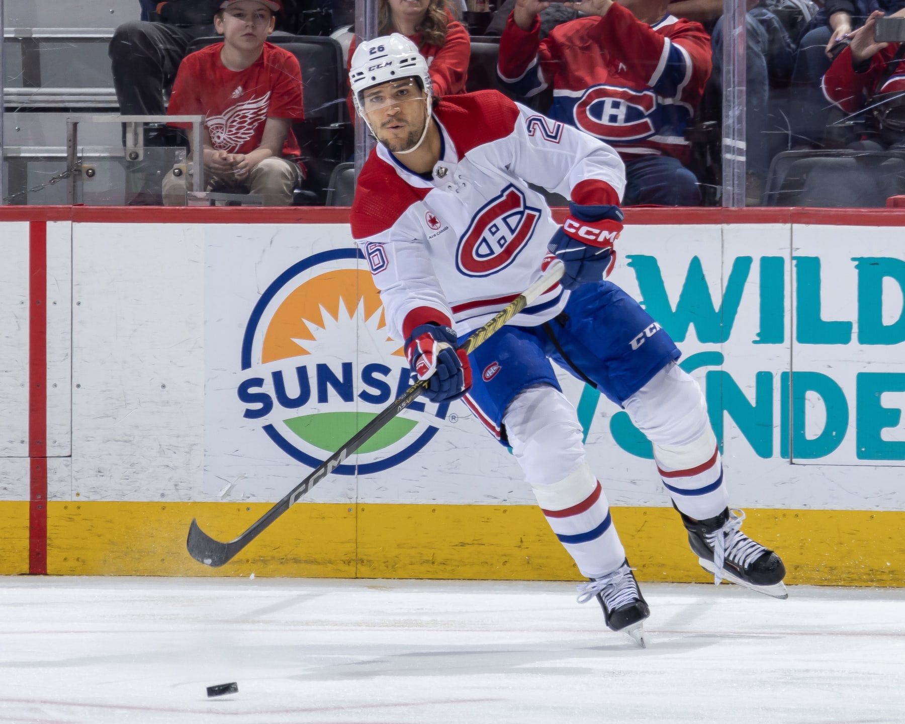 DETROIT, MI - APRIL 15: Johnathan Kovacevic #26 of the Montreal Canadiens passes the puck against the Detroit Red Wings during the second period at Little Caesars Arena on April 15, 2024 in Detroit, Michigan. Detroit defeated Montreal 5-4 in O.T. (Photo by Dave Reginek/NHLI via Getty Images)