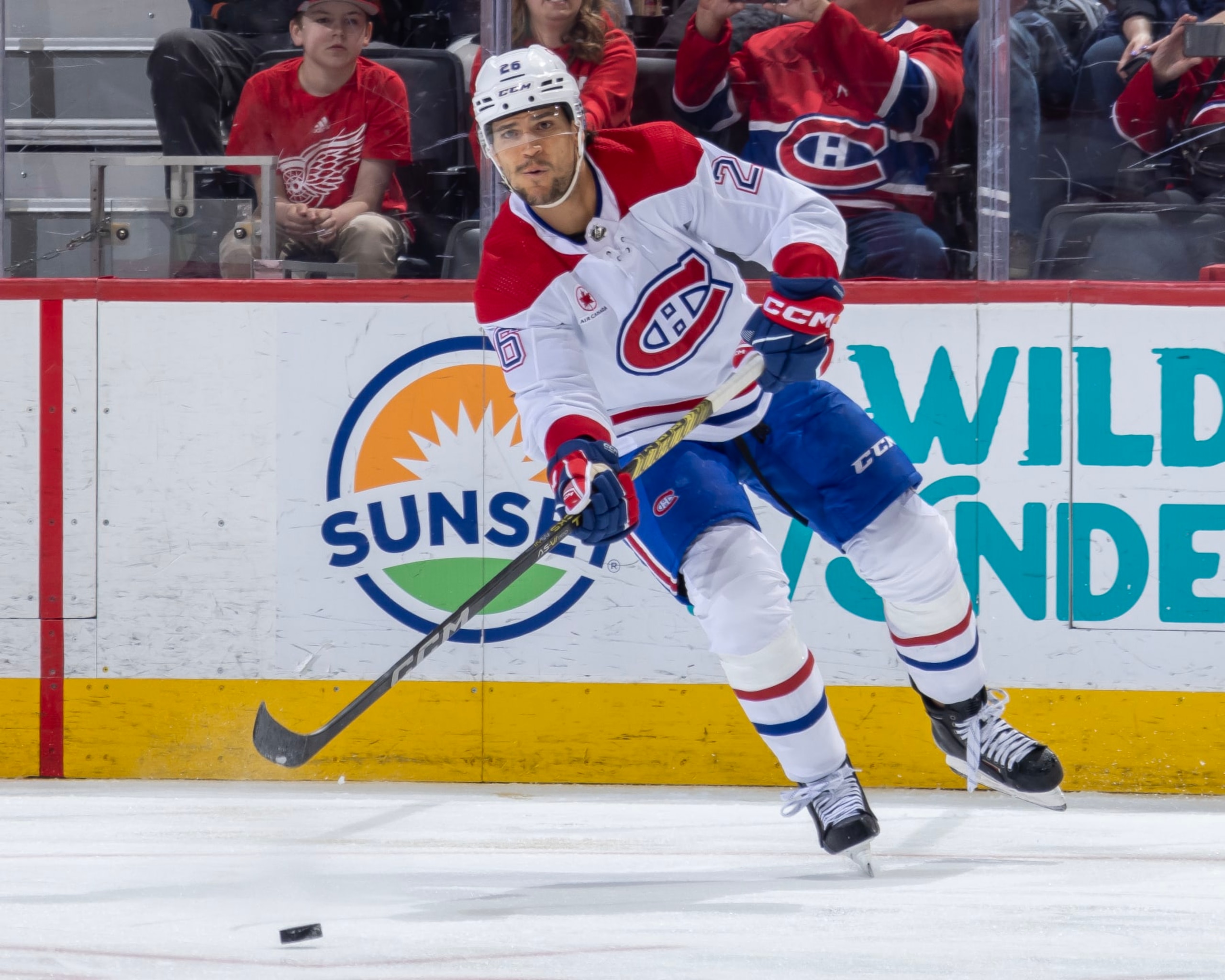 DETROIT, MI - APRIL 15: Johnathan Kovacevic #26 of the Montreal Canadiens passes the puck against the Detroit Red Wings during the second period at Little Caesars Arena on April 15, 2024 in Detroit, Michigan. Detroit defeated Montreal 5-4 in O.T. (Photo by Dave Reginek/NHLI via Getty Images)