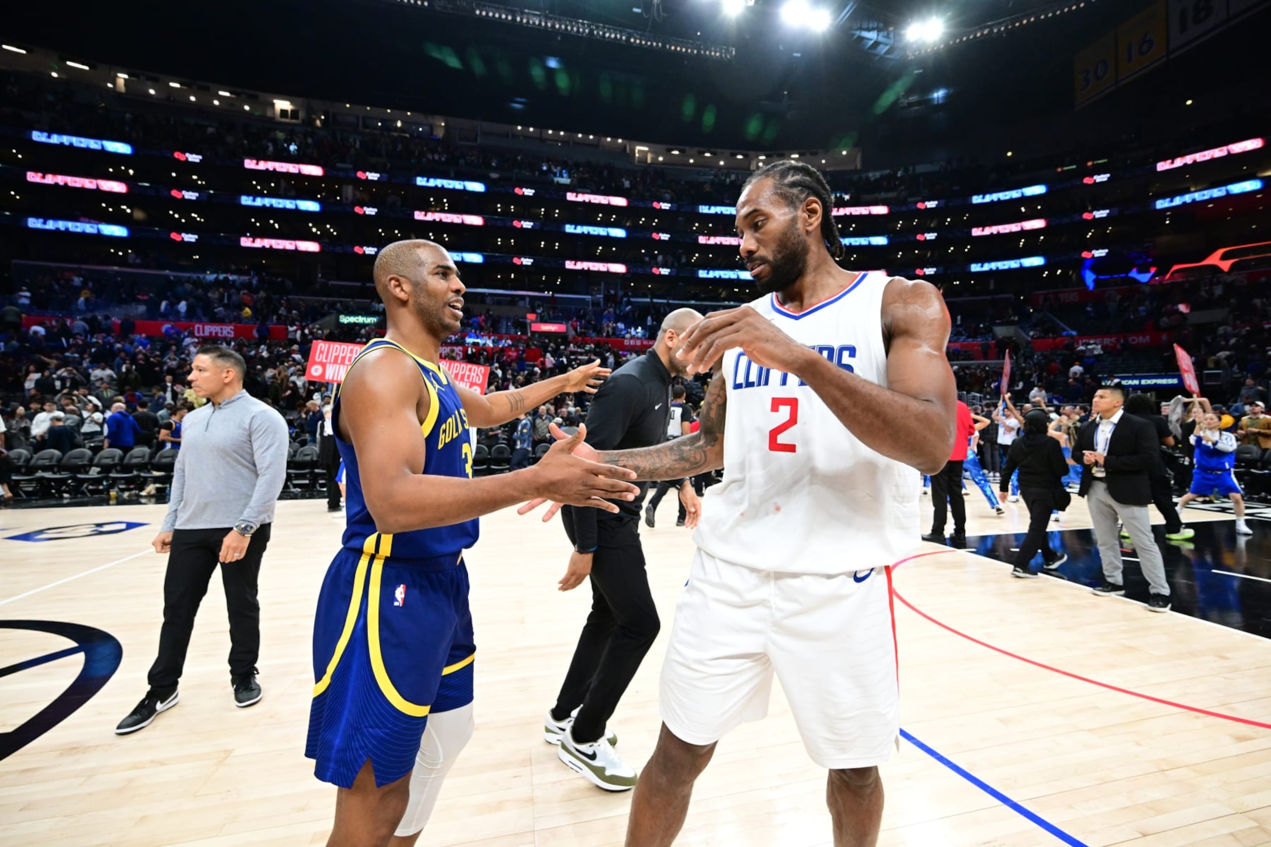 LOS ANGELES, CA - DECEMBER 14: Chris Paul #3 of the Golden State Warriors high fives Kawhi Leonard #2 of the LA Clippers after the game on December 14, 2023 at Crypto.Com Arena in Los Angeles, California. NOTE TO USER: User expressly acknowledges and agrees that, by downloading and/or using this Photograph, user is consenting to the terms and conditions of the Getty Images License Agreement. Mandatory Copyright Notice: Copyright 2023 NBAE (Photo by Adam Pantozzi/NBAE via Getty Images)
