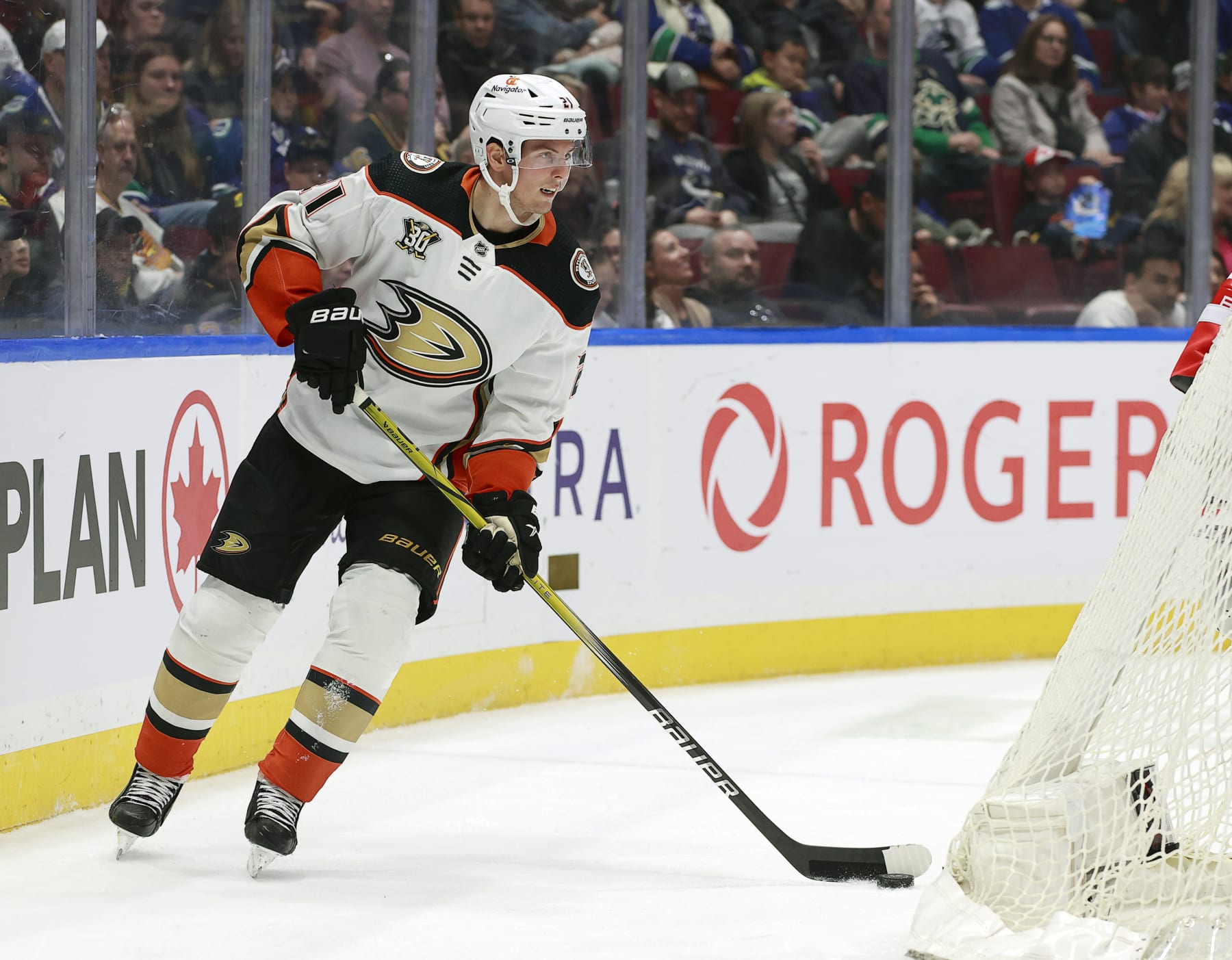 VANCOUVER, CANADA - MARCH 31: Isac Lundestrom #21 of the Anaheim Ducks skates up ice during their NHL game against the Vancouver Canucks at Rogers Arena on March 31, 2024 in Vancouver, British Columbia, Canada.  (Photo by Jeff Vinnick/NHLI via Getty Images)