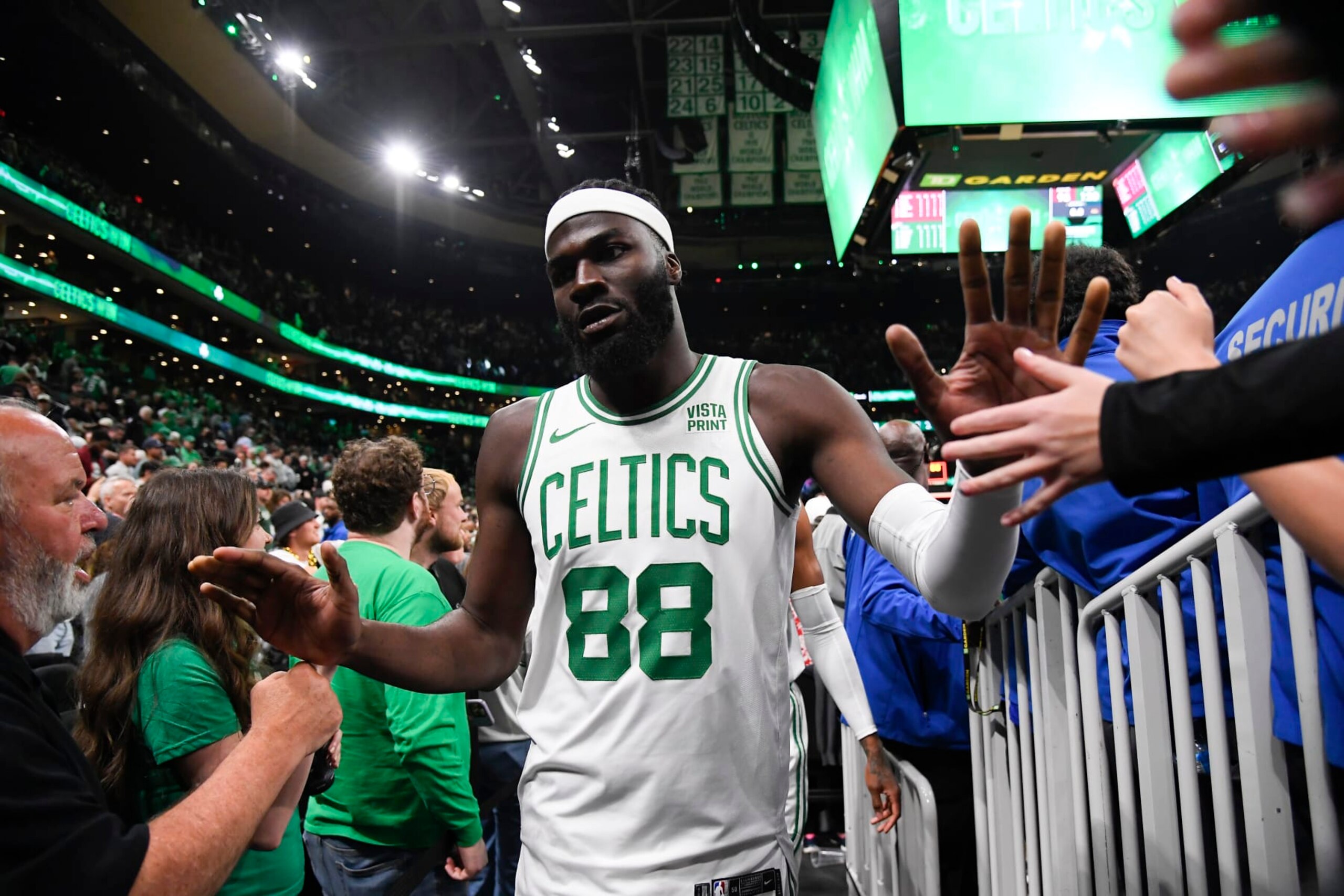 BOSTON, MA - MAY 7: Neemias Queta #88 of the Boston Celtics high fives fans after the game against the Cleveland Cavaliers during Round 2 Game 1 on May 7, 2024 at the TD Garden in Boston, Massachusetts. NOTE TO USER: User expressly acknowledges and agrees that, by downloading and or using this photograph, User is consenting to the terms and conditions of the Getty Images License Agreement. Mandatory Copyright Notice: Copyright 2024 NBAE (Photo by Brian Babineau/NBAE via Getty Images) BOSTON, MA - MAY 7: Neemias Queta #88 of the Boston Celtics high fives fans after the game against the Cleveland Cavaliers during Round 2 Game 1 on May 7, 2024 at the TD Garden in Boston, Massachusetts. NOTE TO USER: User expressly acknowledges and agrees that, by downloading and or using this photograph, User is consenting to the terms and conditions of the Getty Images License Agreement. Mandatory Copyright Notice: Copyright 2024 NBAE (Photo by Brian Babineau/NBAE via Getty Images)