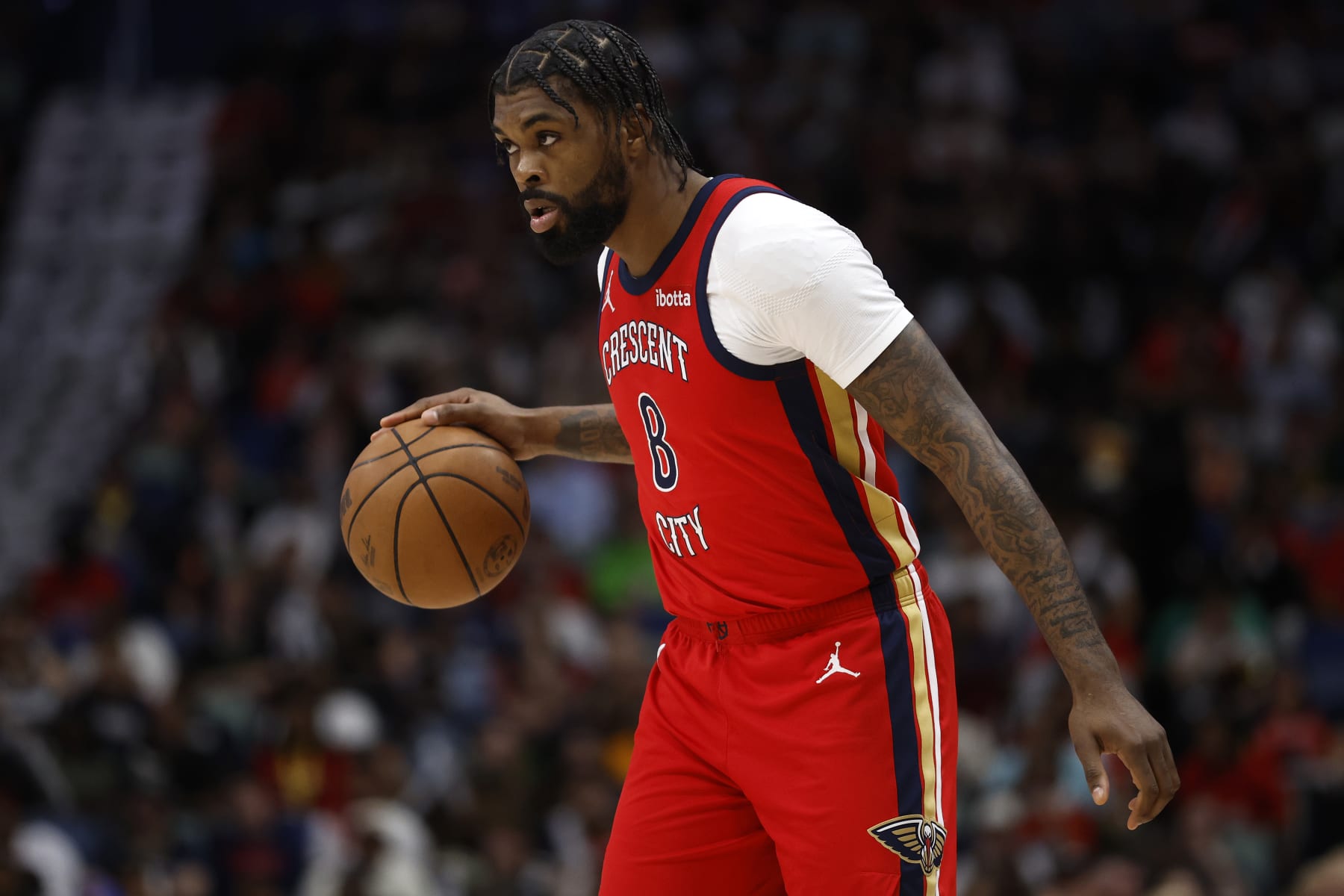 NEW ORLEANS, LOUISIANA - APRIL 19: Naji Marshall #8 of the New Orleans Pelicans drives the ball up the court against the Sacramento Kings at Smoothie King Center on April 19, 2024 in New Orleans, Louisiana. NOTE TO USER: User expressly acknowledges and agrees that, by downloading and or using this photograph, User is consenting to the terms and conditions of the Getty Images License Agreement.  (Photo by Chris Graythen/Getty Images)