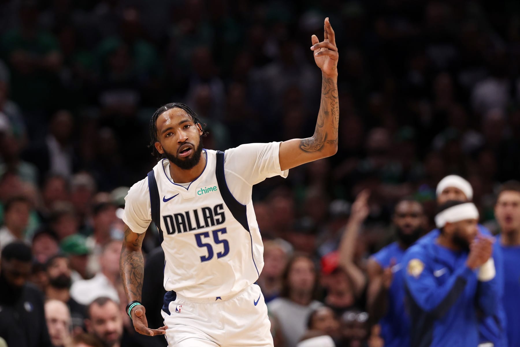 BOSTON, MASSACHUSETTS - JUNE 17: Derrick Jones Jr. #55 of the Dallas Mavericks after a three point basket against the Boston Celtics during the second quarter of Game Five of the 2024 NBA Finals at TD Garden on June 17, 2024 in Boston, Massachusetts. NOTE TO USER: User expressly acknowledges and agrees that, by downloading and or using this photograph, User is consenting to the terms and conditions of the Getty Images License Agreement. (Photo by Elsa/Getty Images)